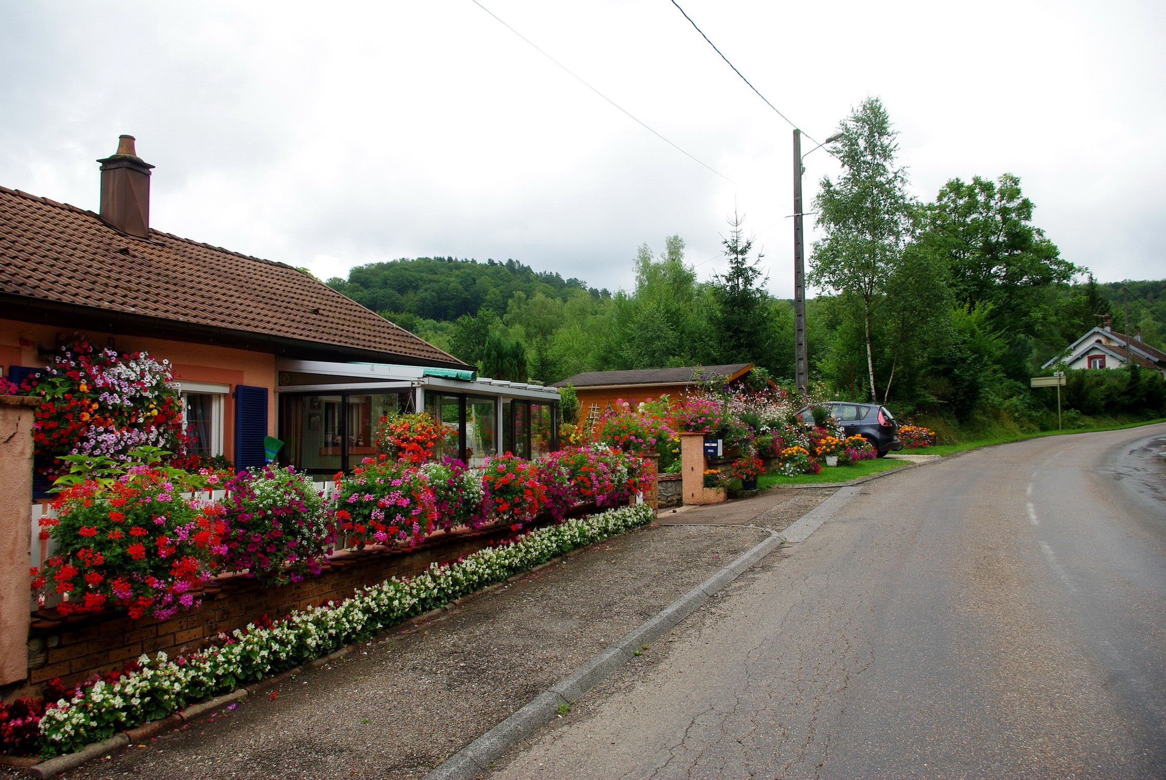 House with flowers in France HD Wallpaper