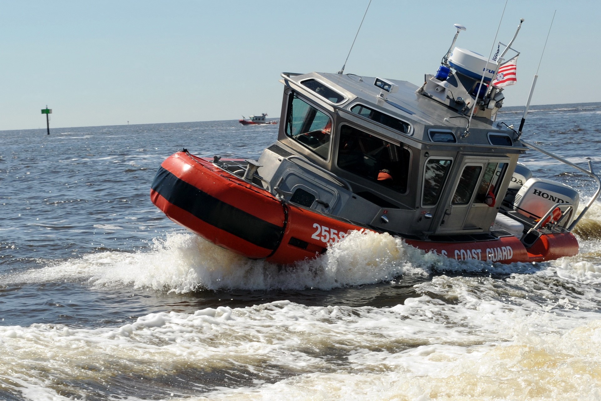 US Coast Guard boat speeding through water HD Wallpaper