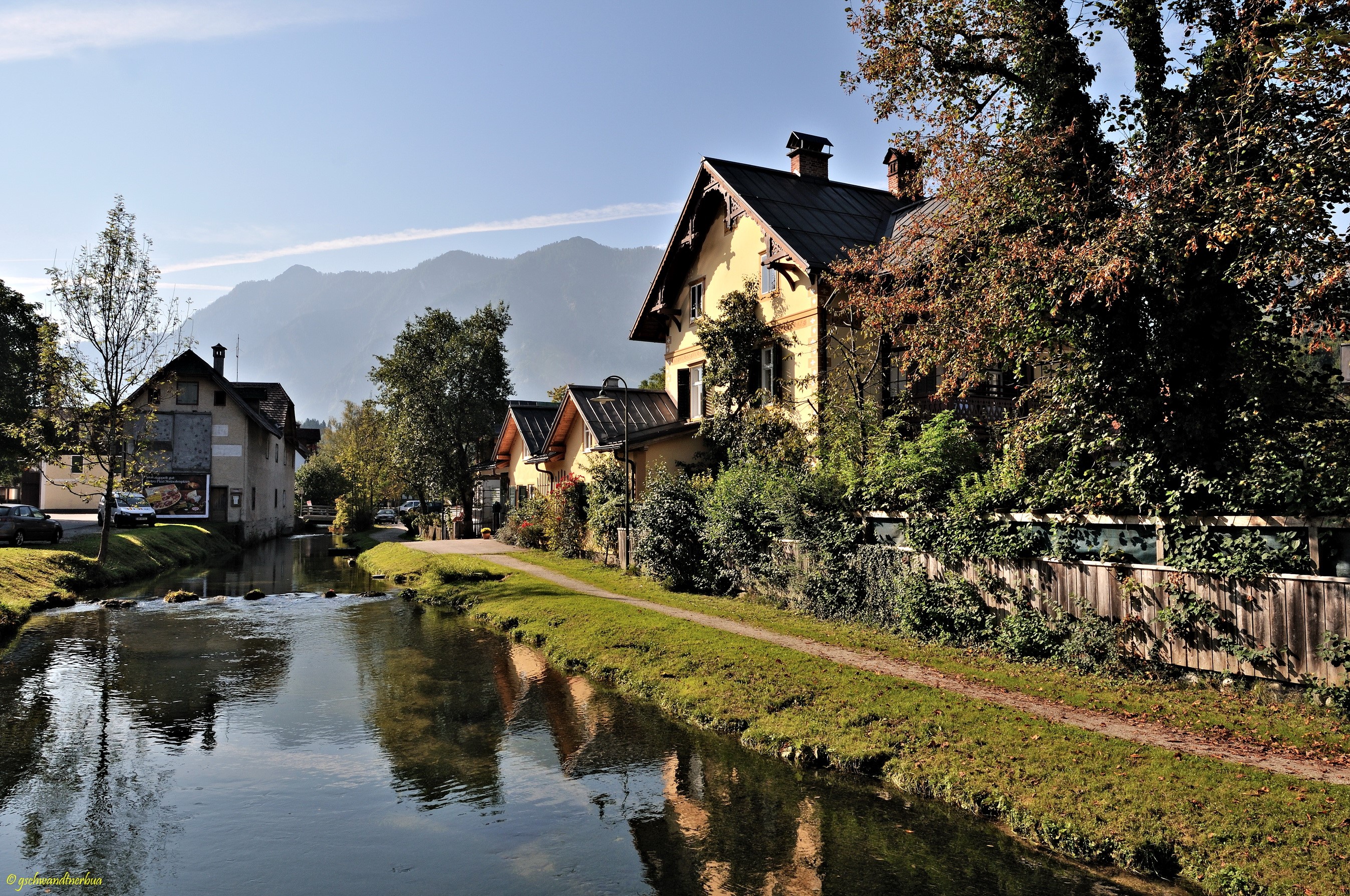 Houses along a canal in Austria HD Wallpaper