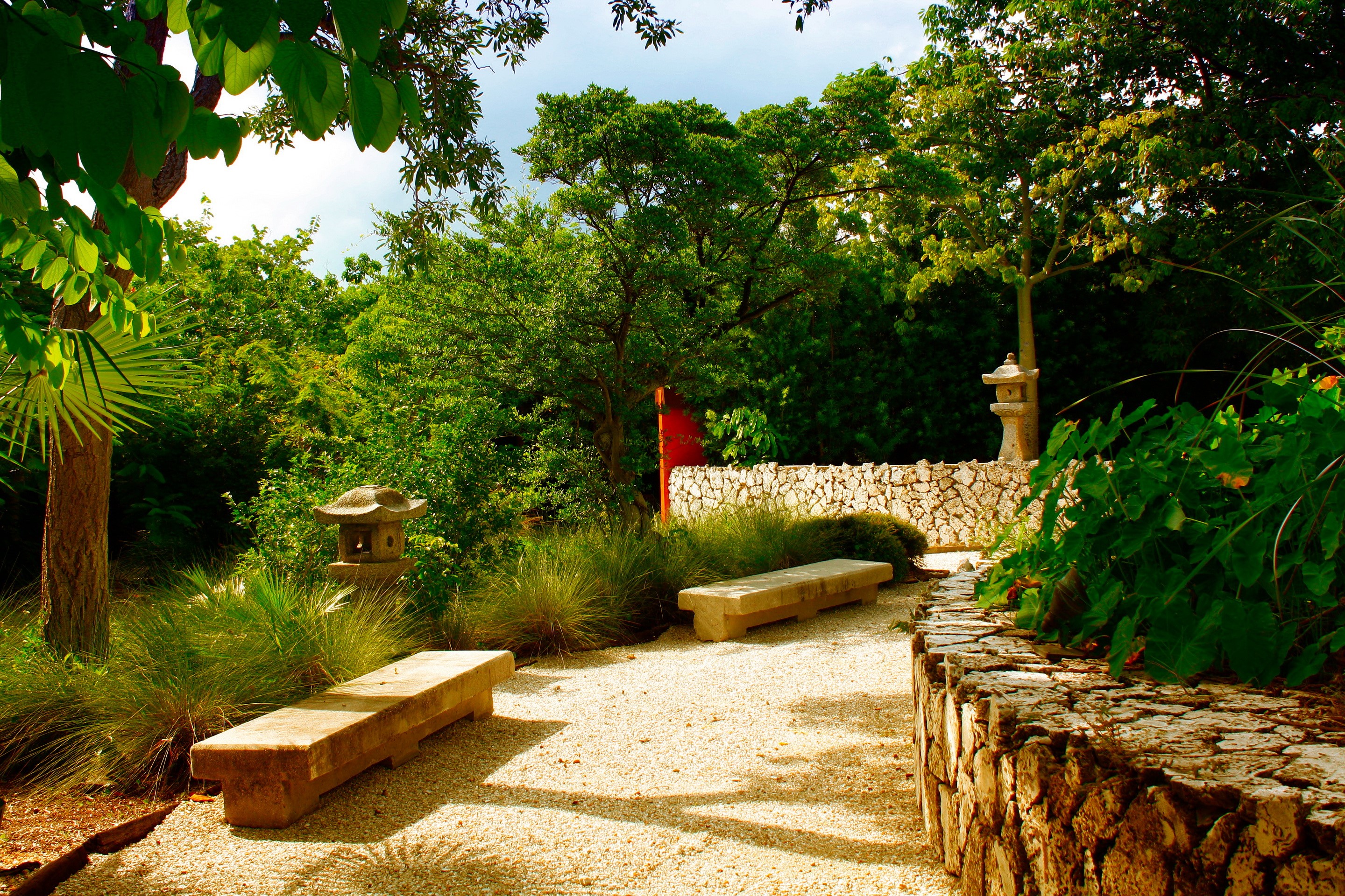 Japanese Garden in Miami with Stone Benches and Lanterns HD Wallpaper