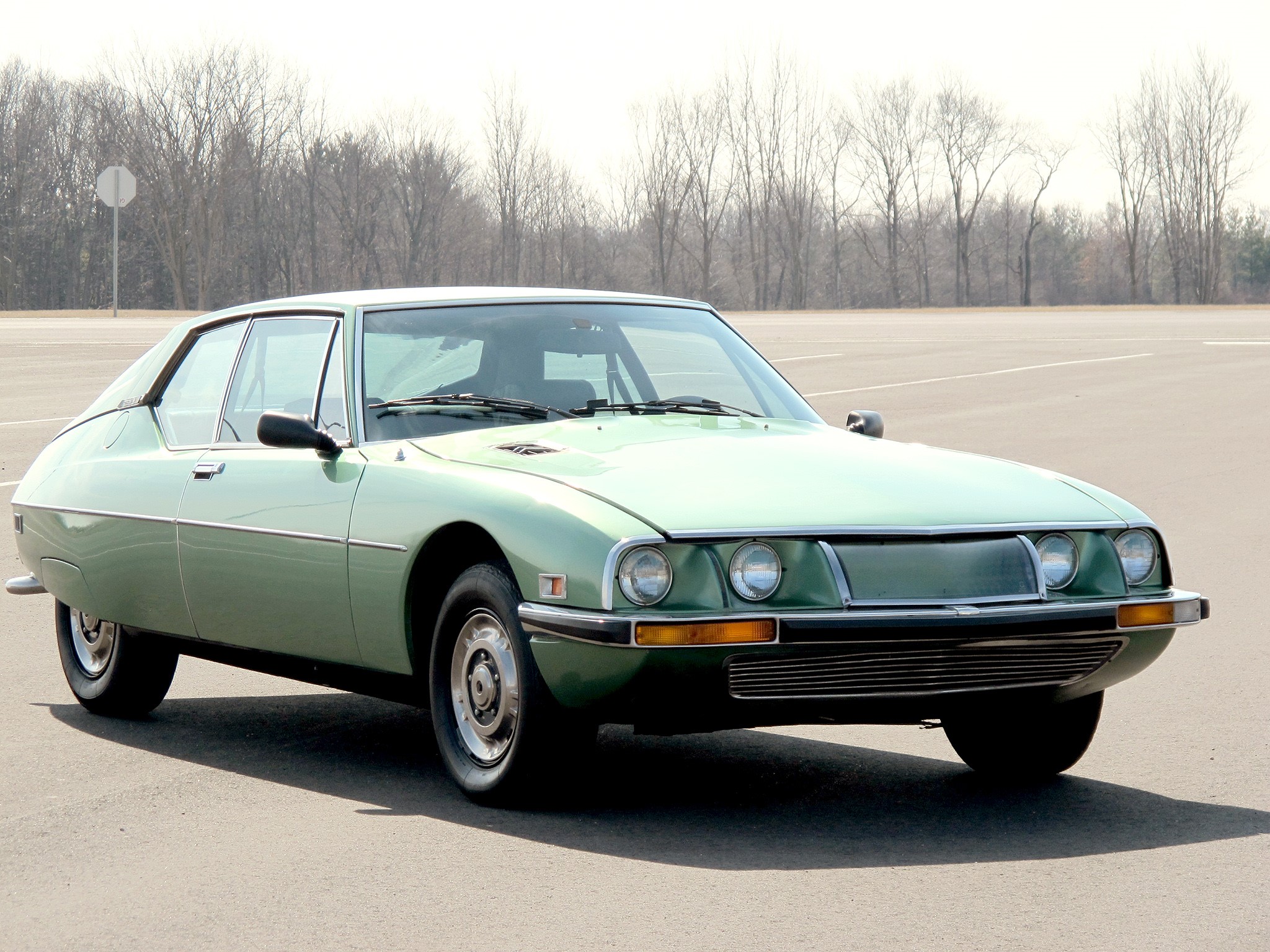 Green Citroen SM parked on asphalt HD Wallpaper