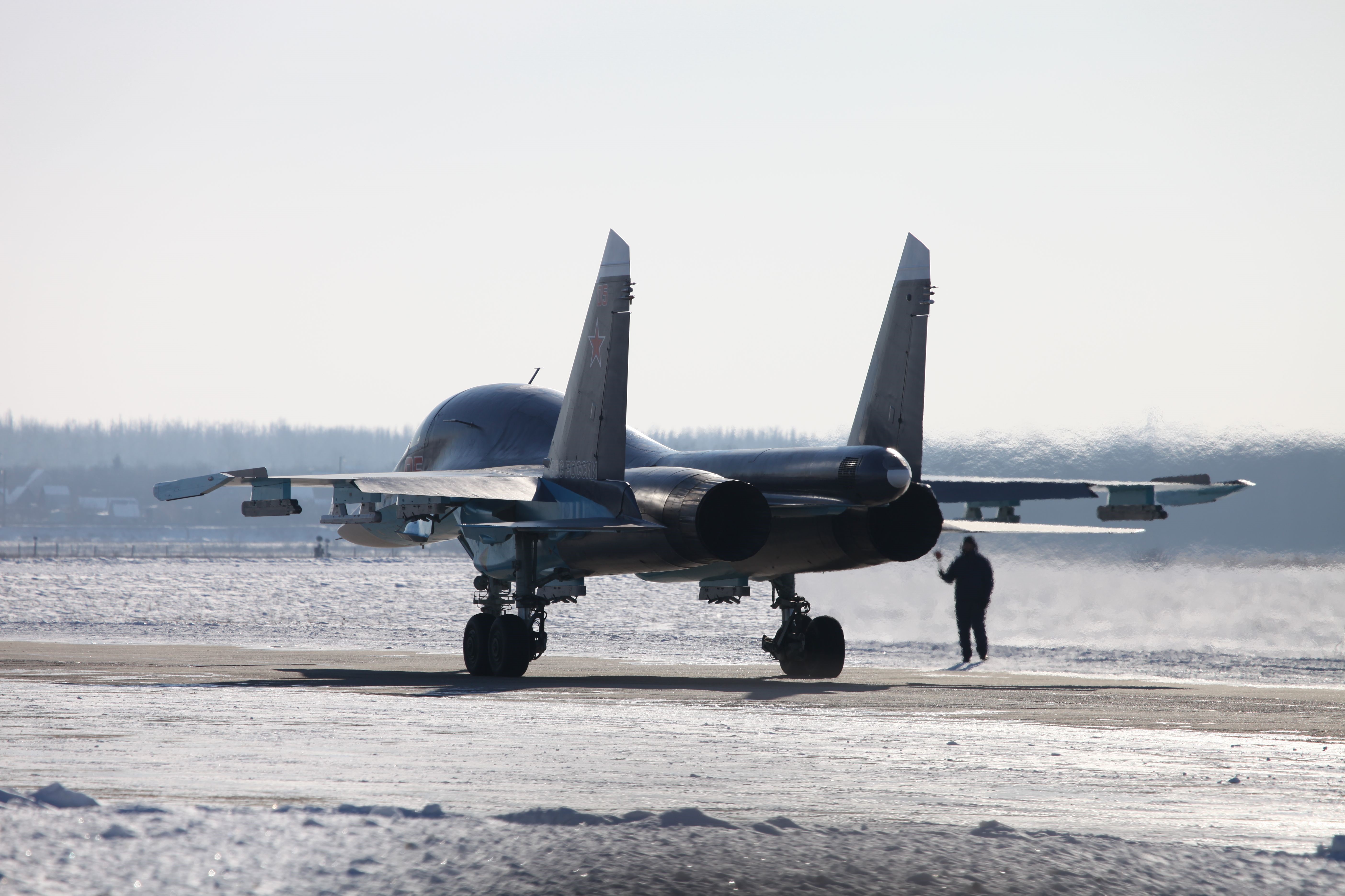 Airplane on a snowy runway HD Wallpaper