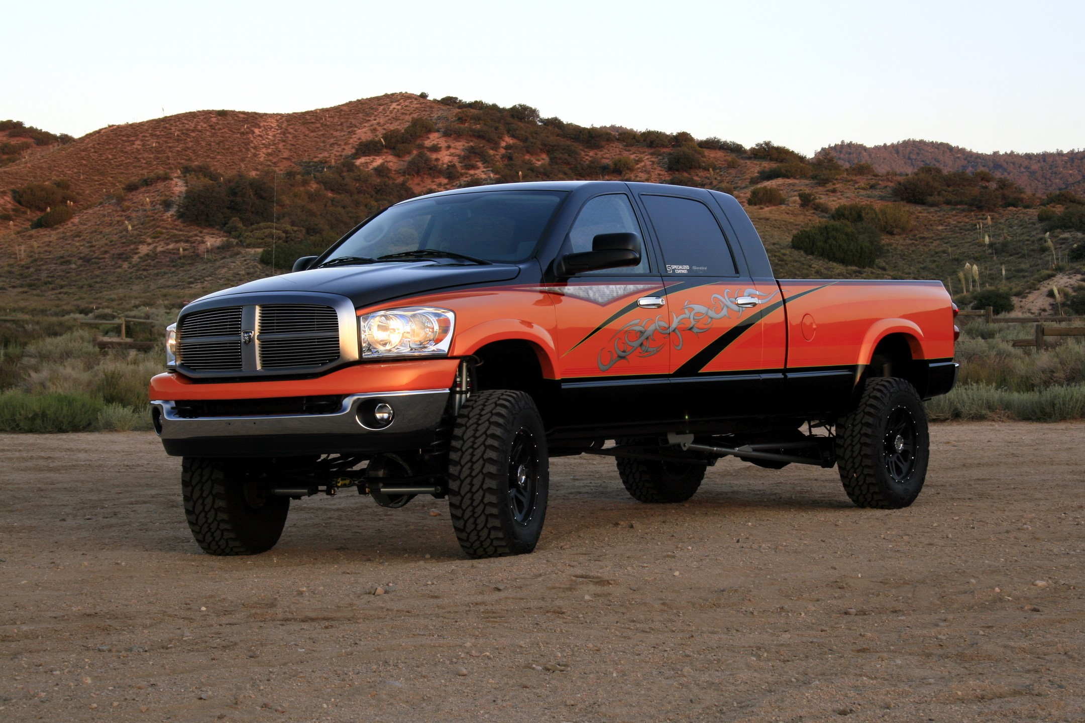 Orange and black lifted Dodge Ram truck HD Wallpaper