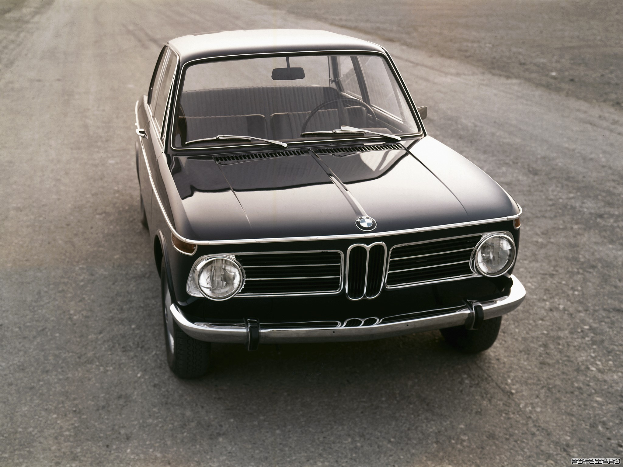 Black BMW 2002 parked on a dirt road HD Wallpaper