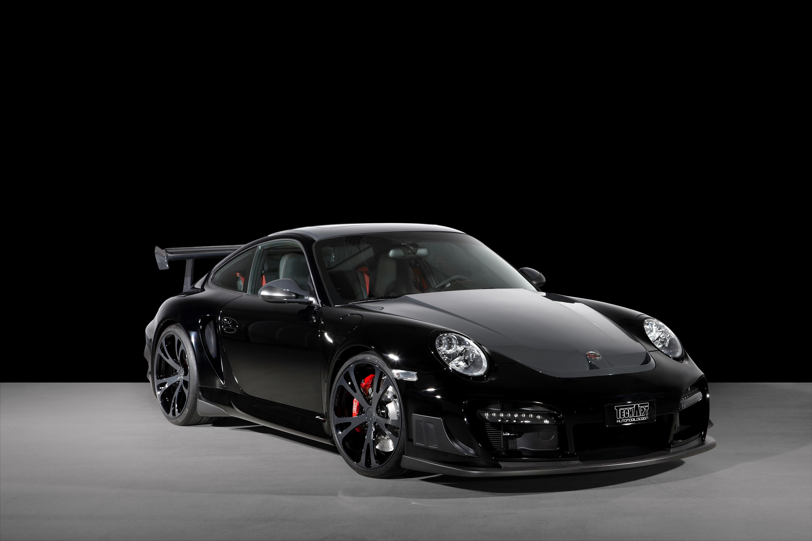 Black Porsche 911 GT3 RS with a large rear spoiler HD Wallpaper
