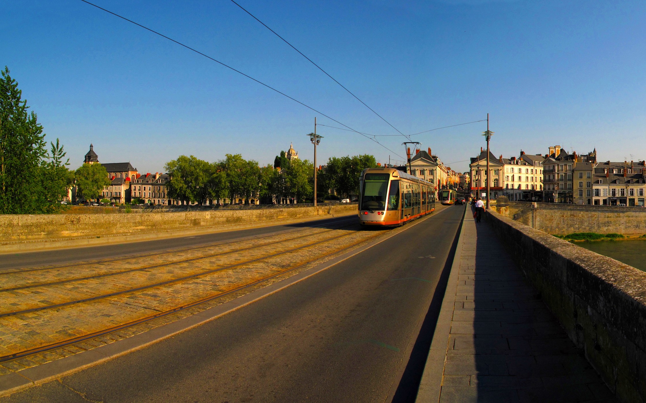Tram on a bridge in France HD Wallpaper