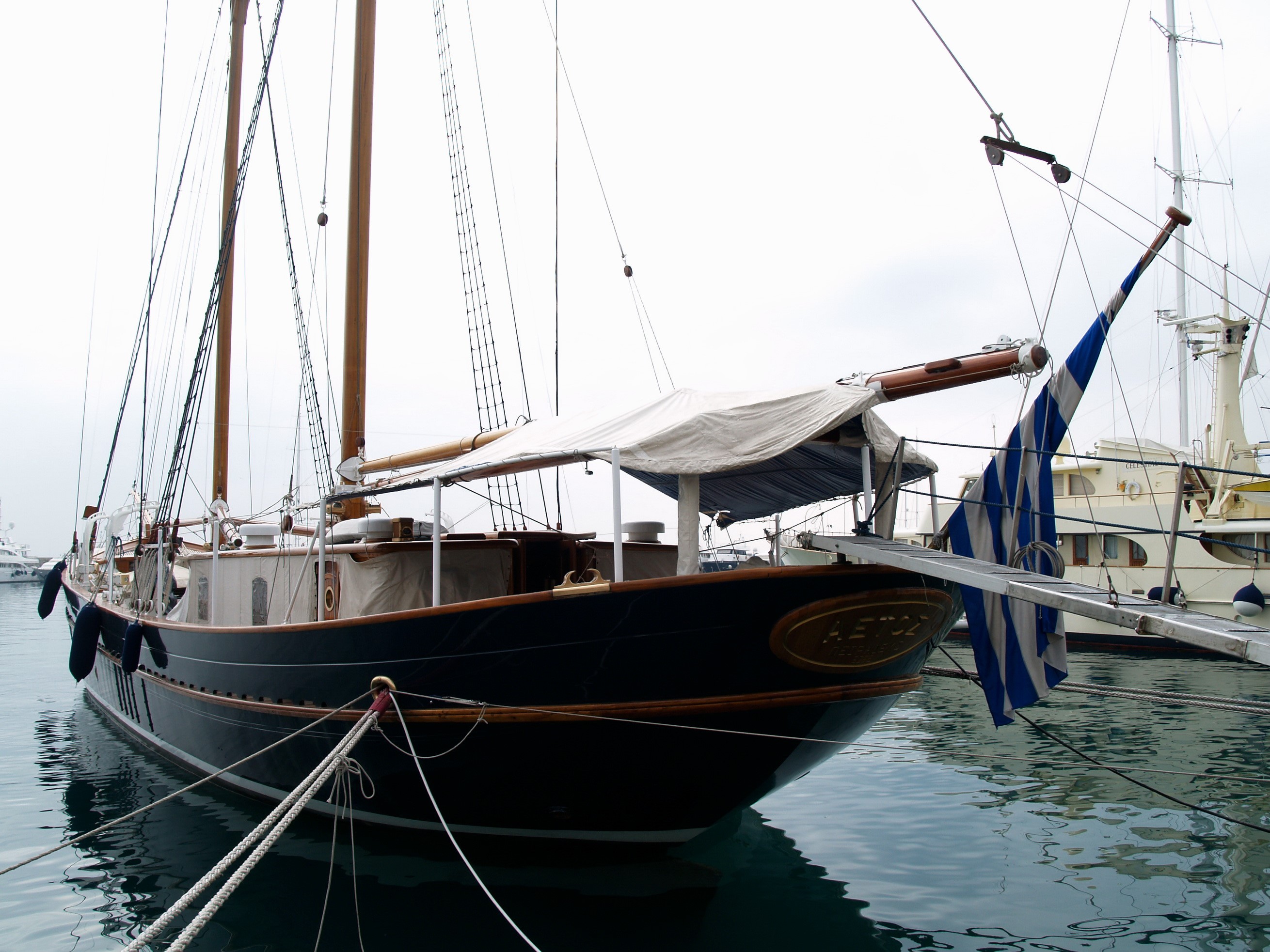 Aetos sailing ship in a harbor HD Wallpaper