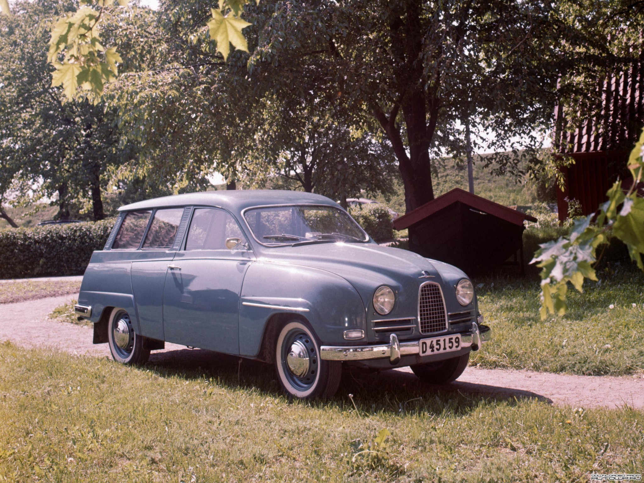 Blue Saab 95 Station Wagon parked on grass HD Wallpaper