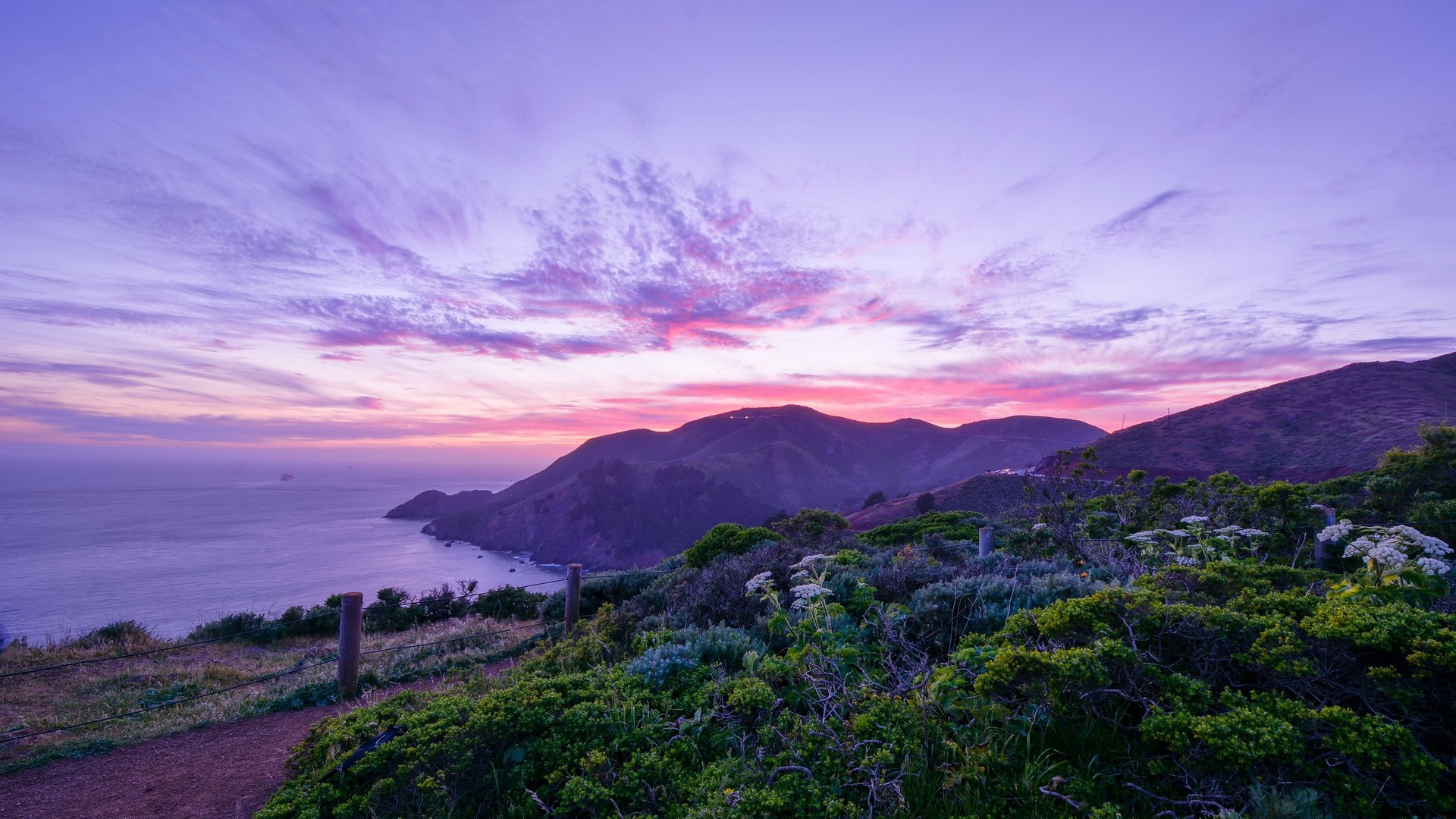Purple sunset over coastal mountains and ocean HD Wallpaper