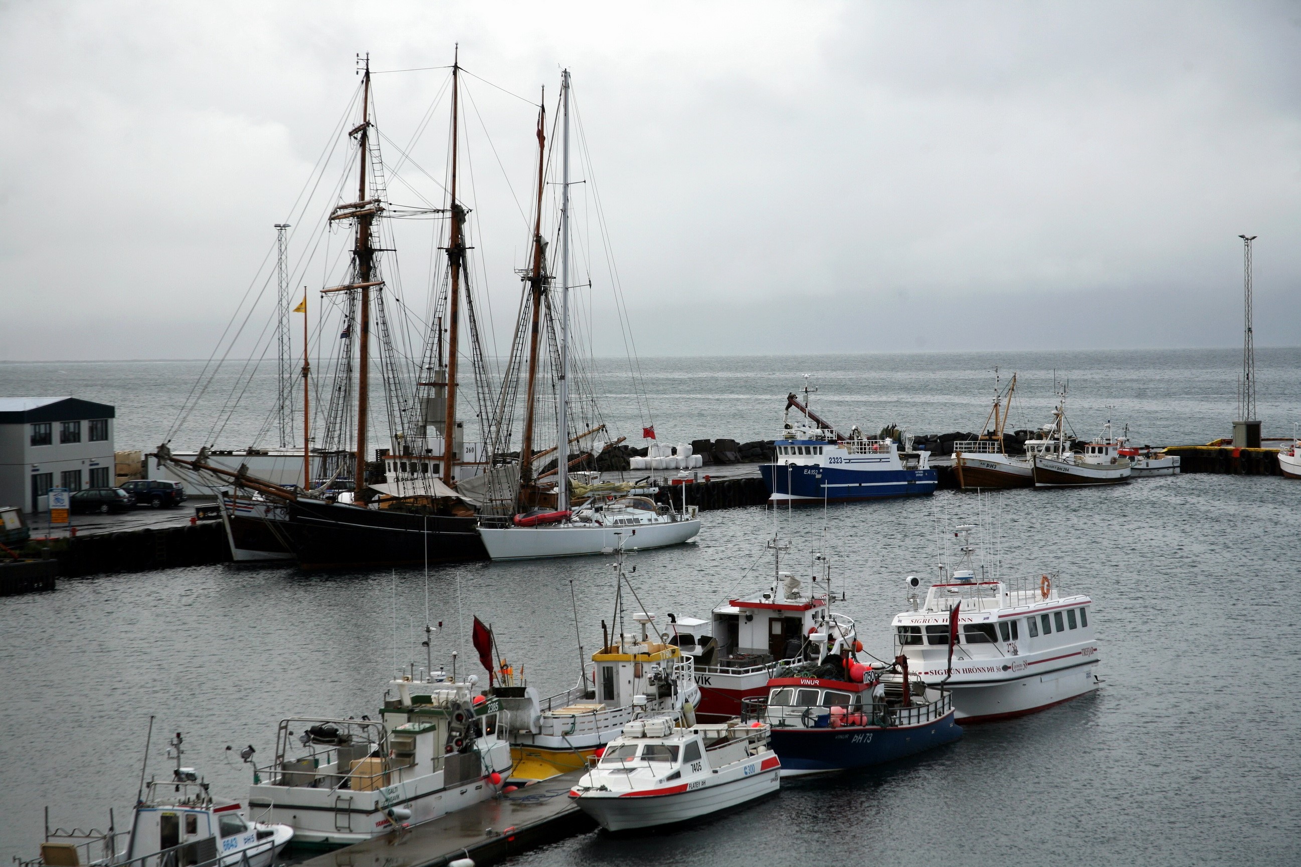 Sailing ships and boats docked in a harbor HD Wallpaper