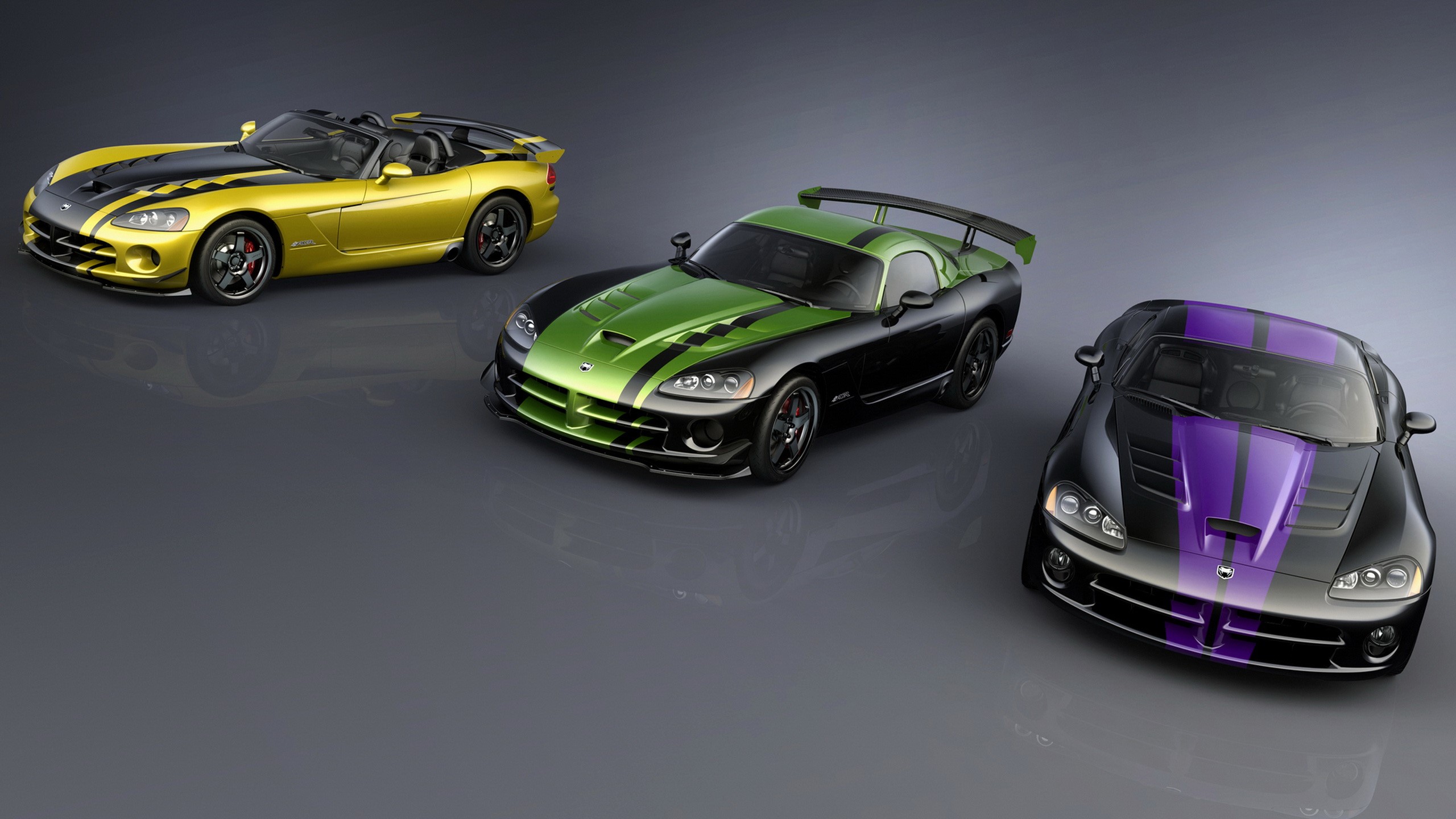 Three Dodge SRT Viper GTS cars with racing stripes HD Wallpaper