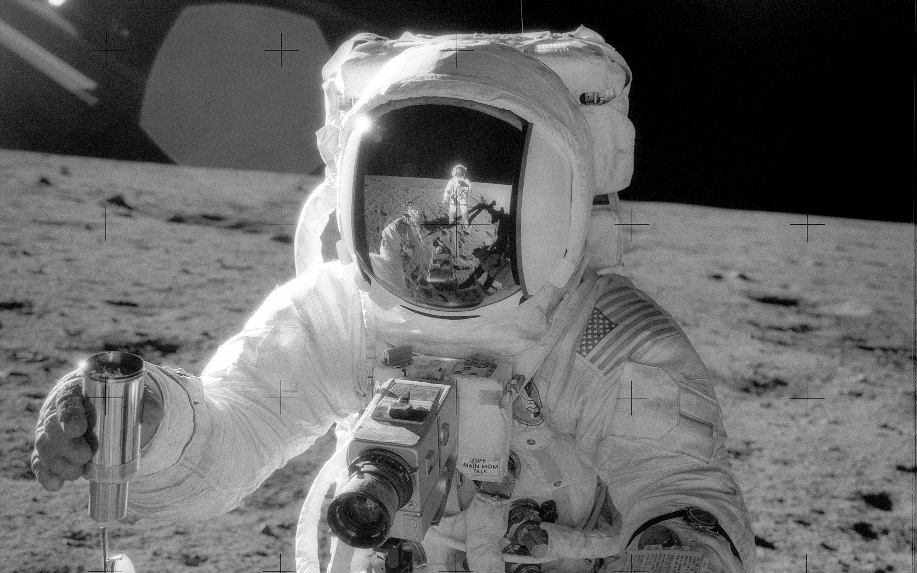 Astronaut on the Moon with Camera HD Wallpaper
