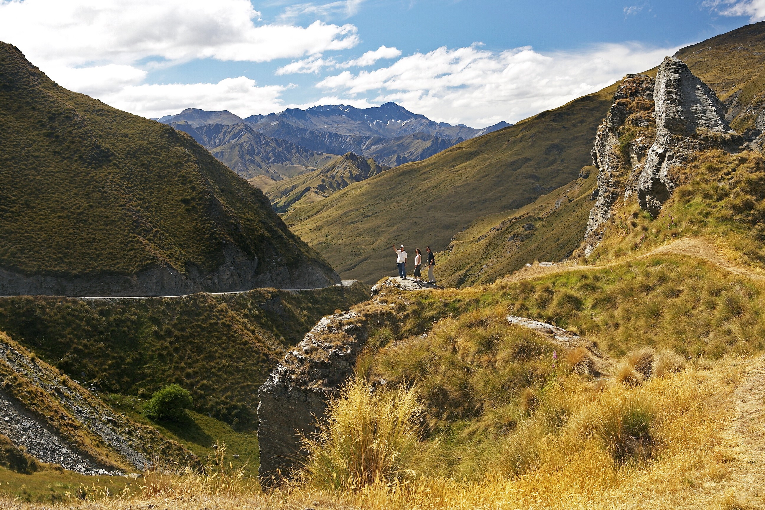 People on a mountain road in Skippers Canyon, Queenstown, New Zealand HD Wallpaper