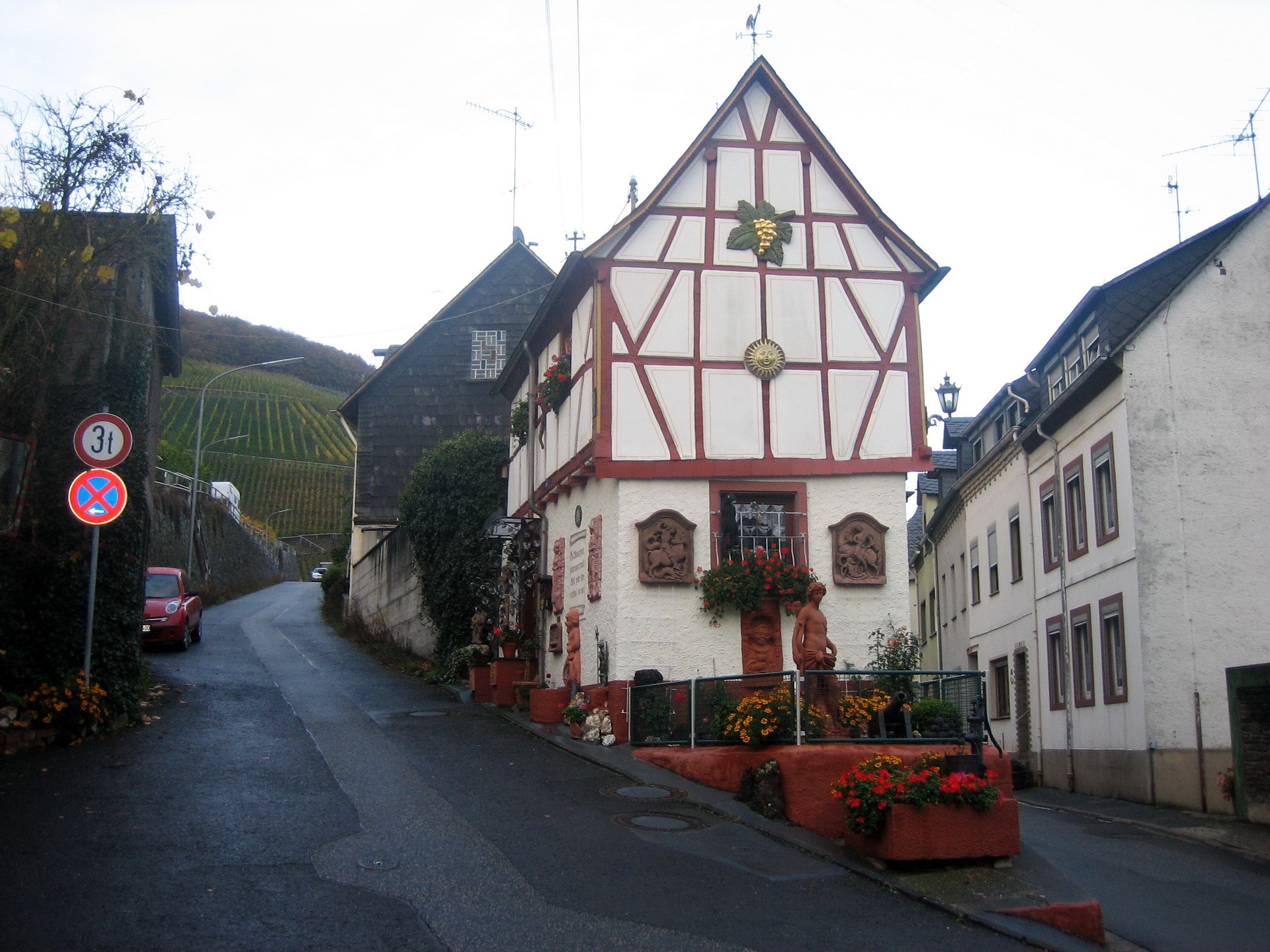 Half-timbered house in a German village with vineyards HD Wallpaper