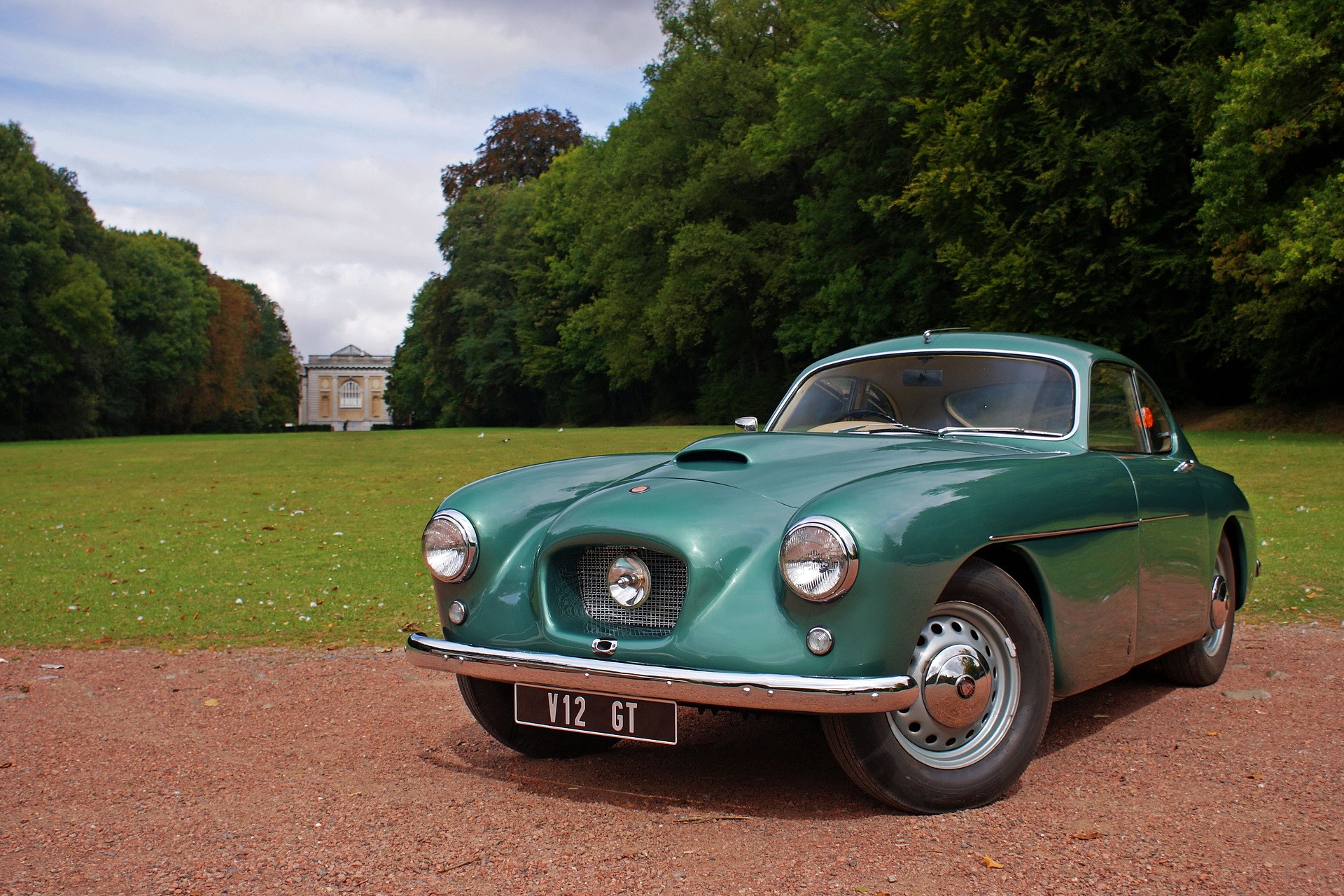 Green Bristol 405 GT car parked in front of a building HD Wallpaper