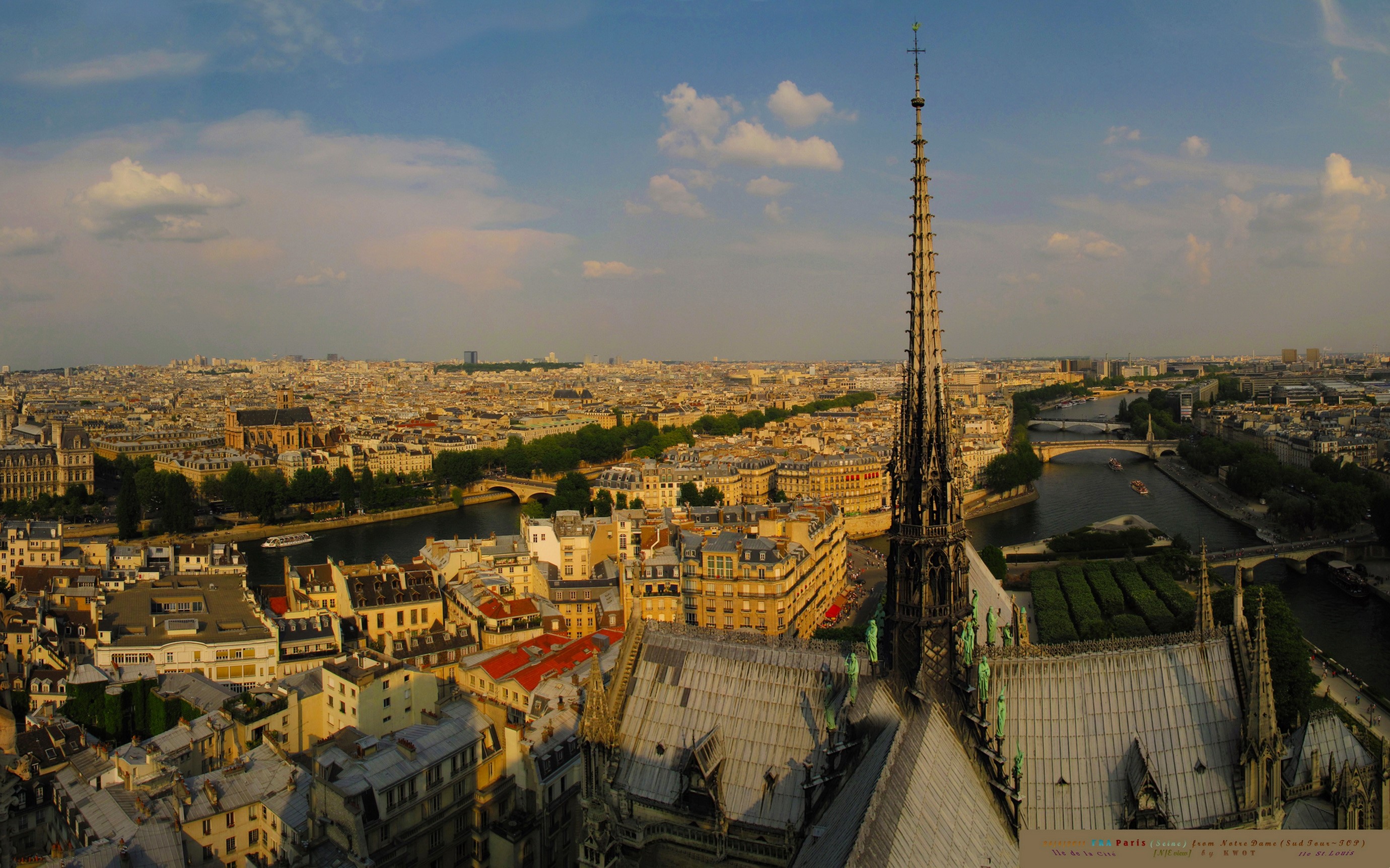 Paris skyline with Notre Dame spire and Seine River HD Wallpaper