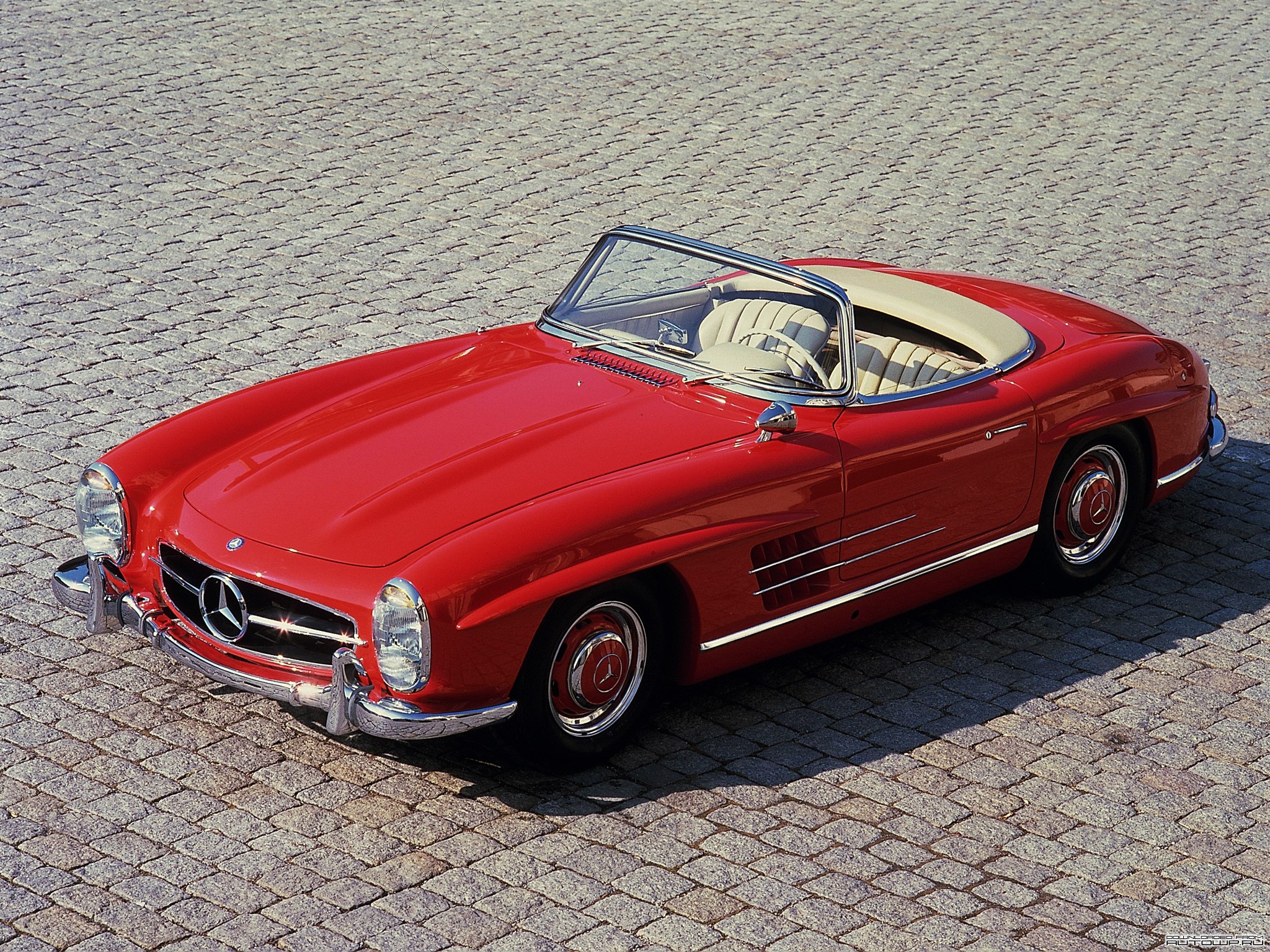 Red Mercedes-Benz 300 SL Roadster on cobblestone HD Wallpaper