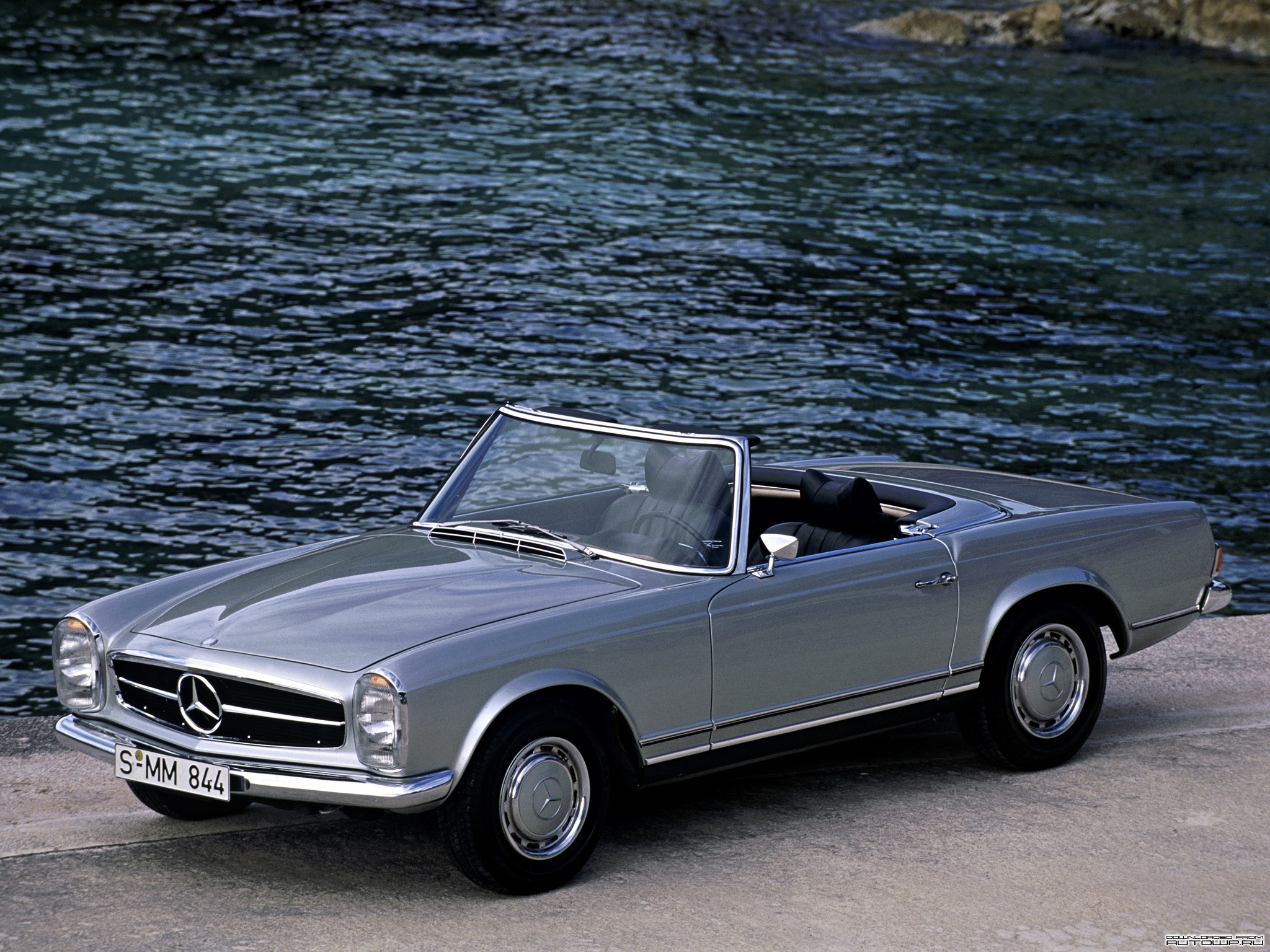 Silver Mercedes-Benz SL convertible by the water HD Wallpaper