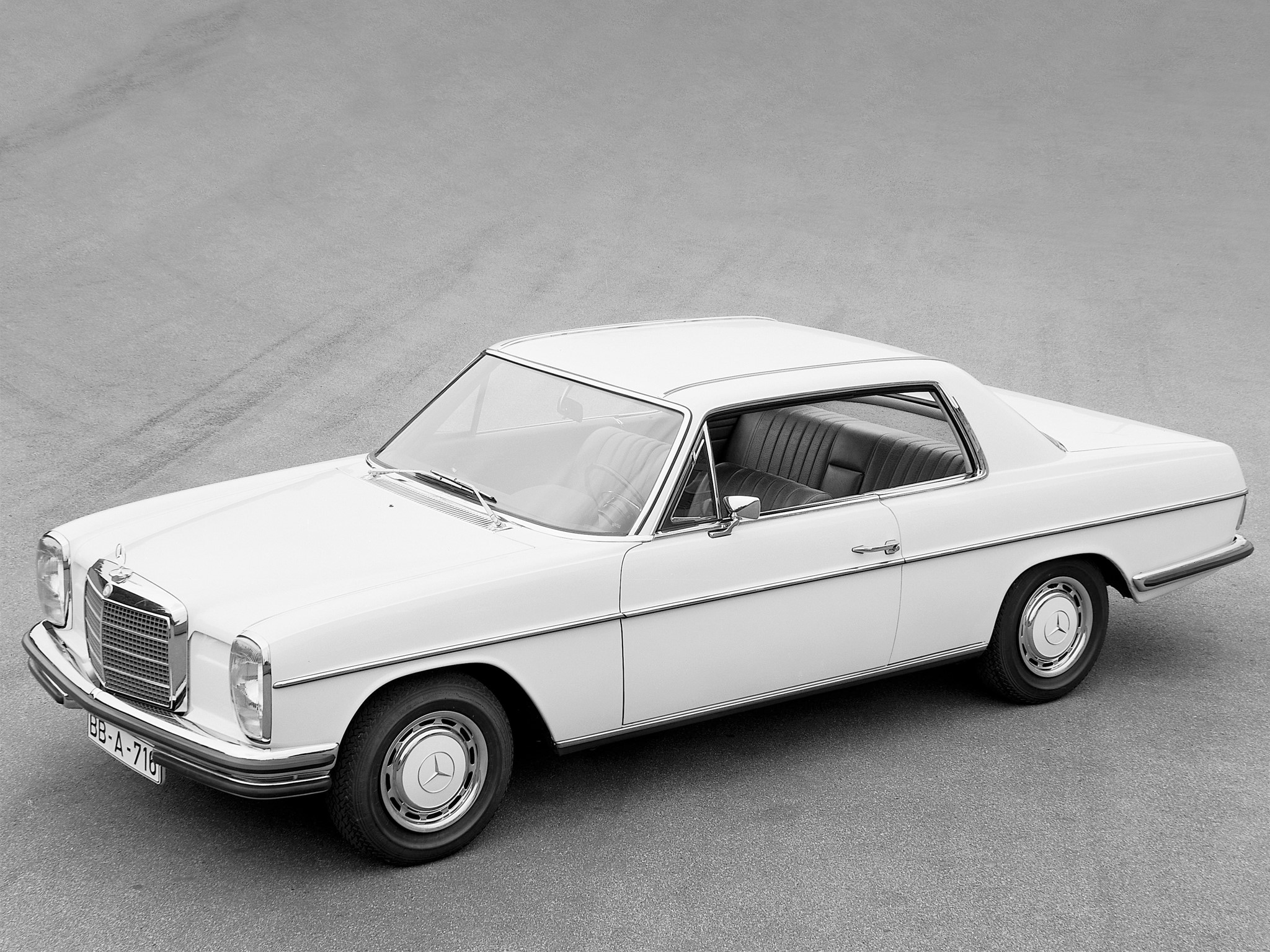White Mercedes-Benz Coupe on a Gray Surface HD Wallpaper