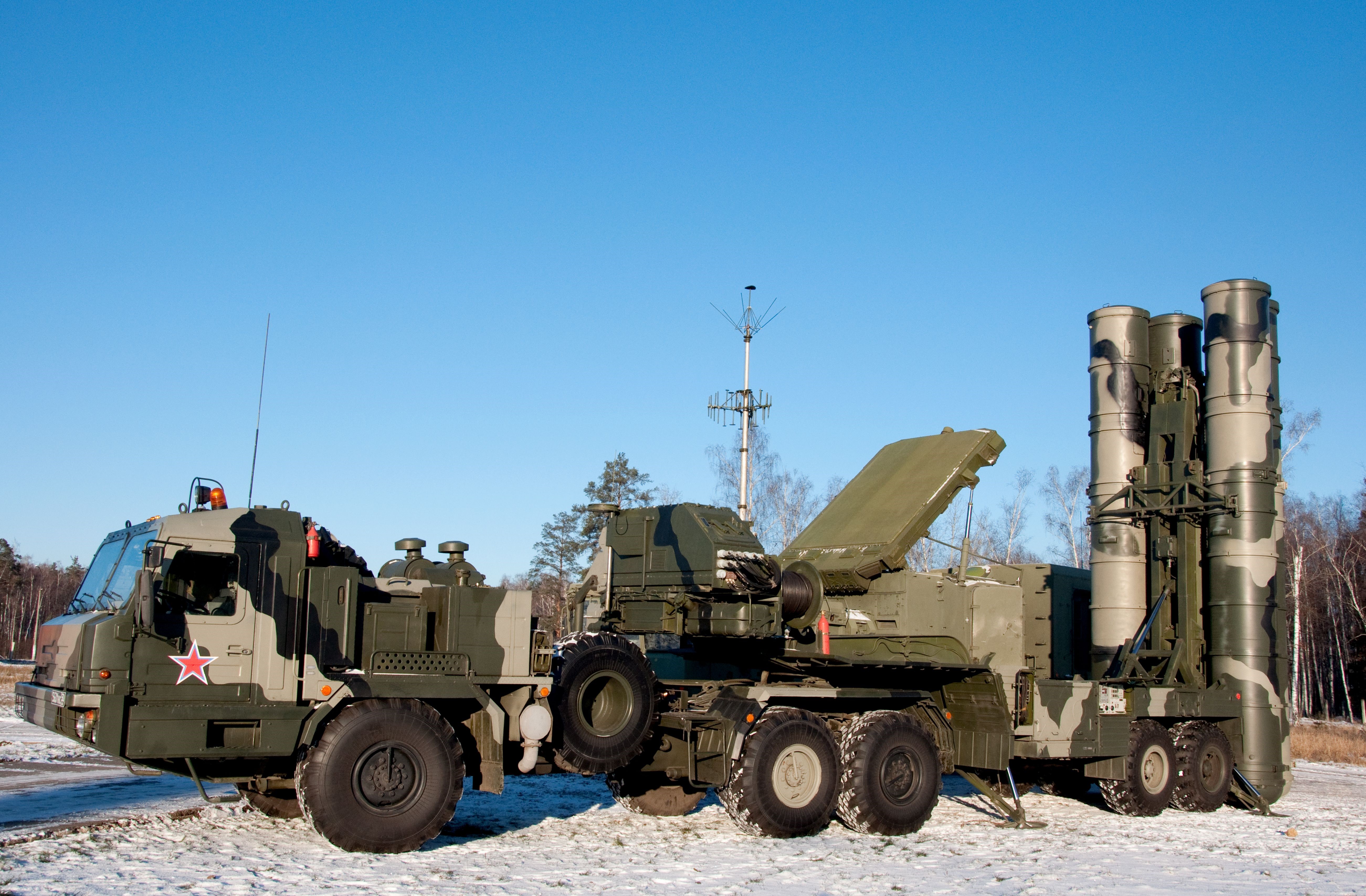 Missile launchers on a truck in a snowy field HD Wallpaper