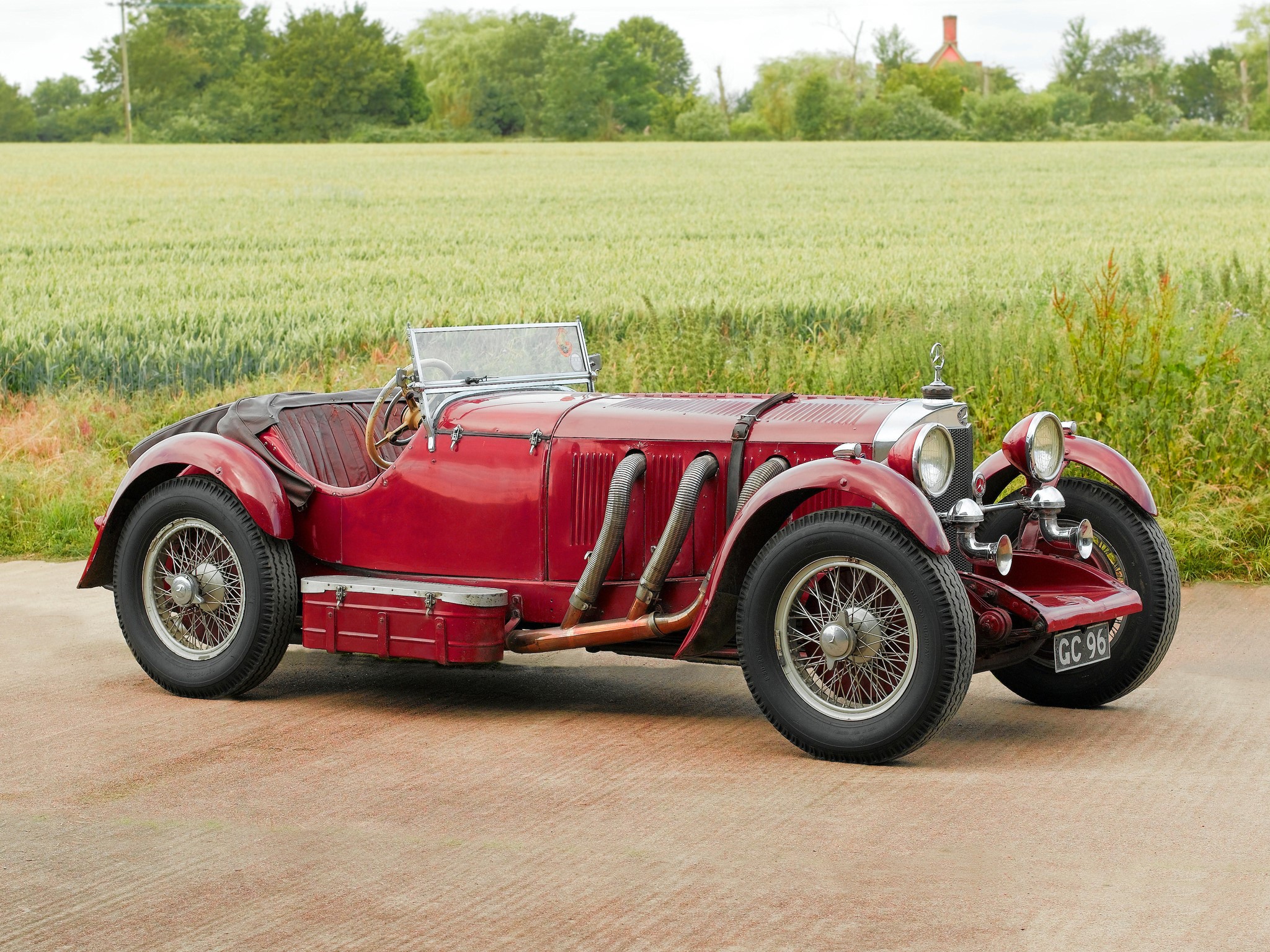 Red vintage Mercedes-Benz car in a field HD Wallpaper