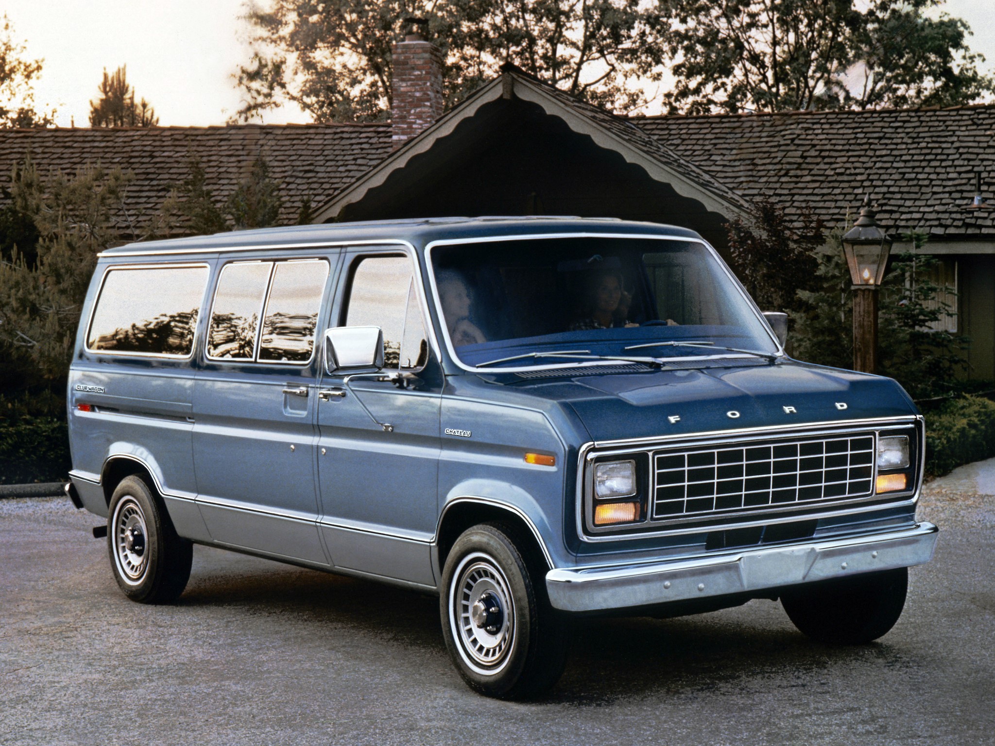 Blue Ford Econoline Van parked in front of a house HD Wallpaper