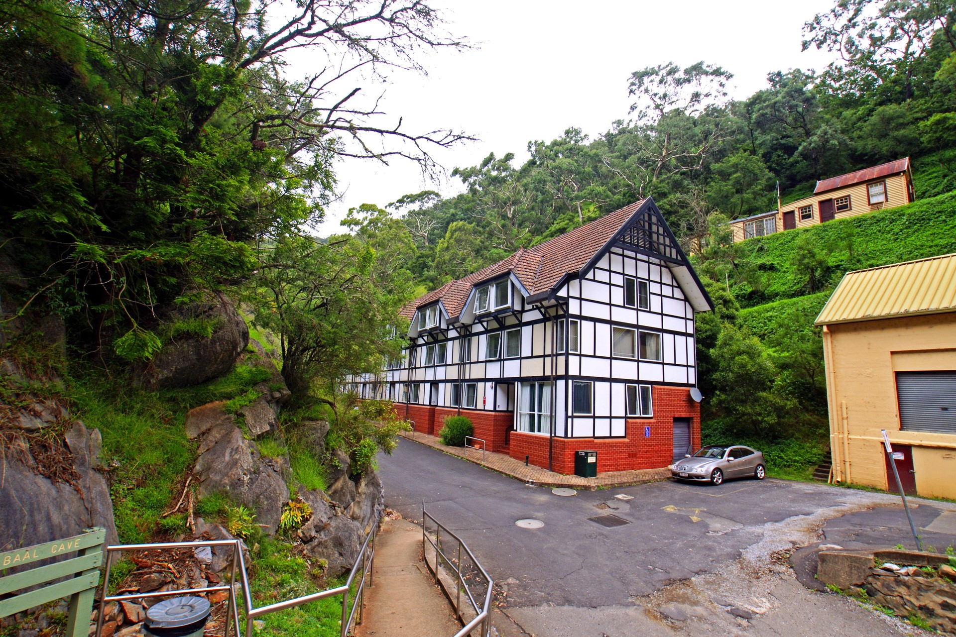 Tudor-style building in a forest setting, Australia HD Wallpaper