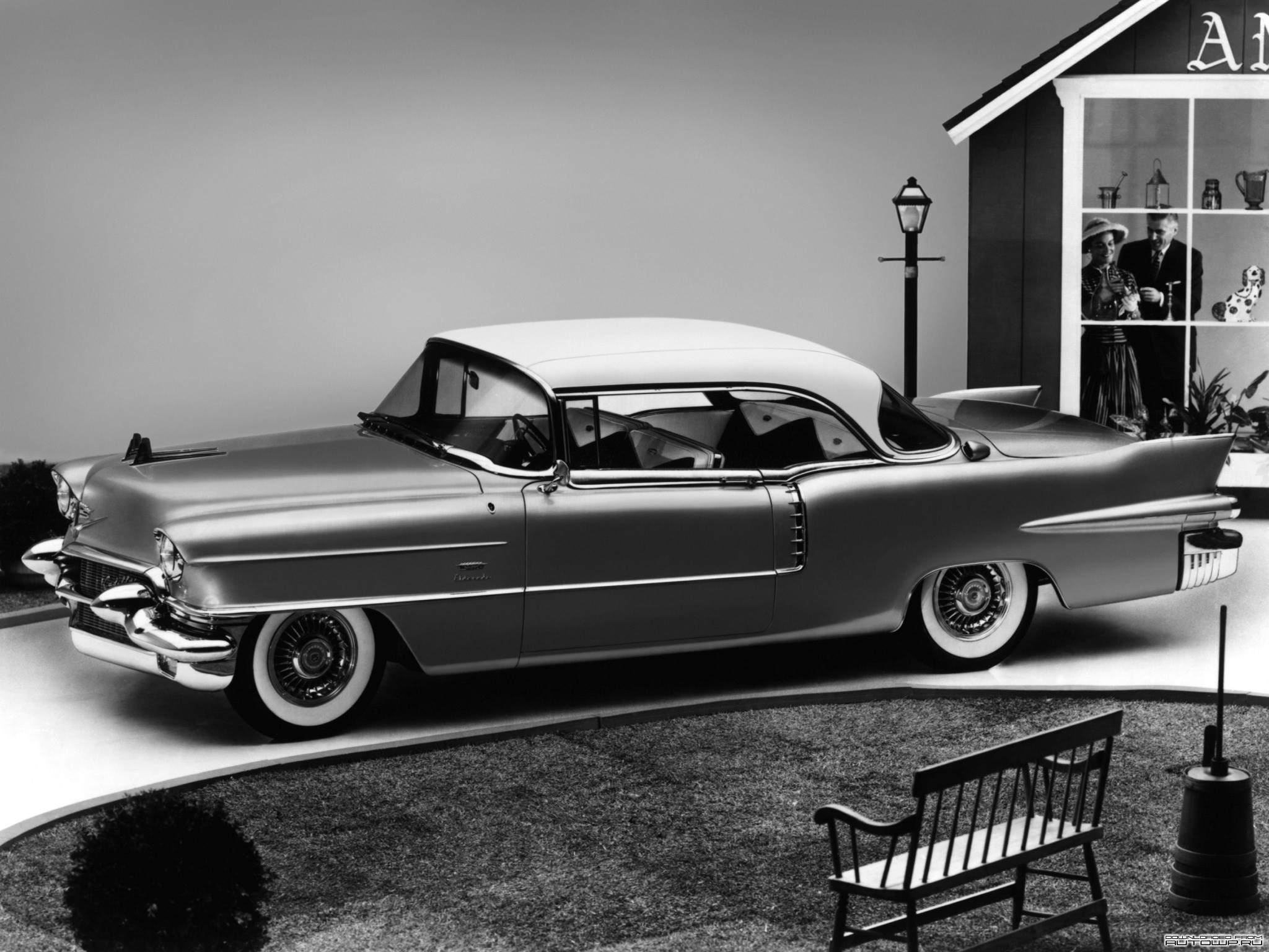 1956 Cadillac Eldorado Seville with a couple in a window HD Wallpaper