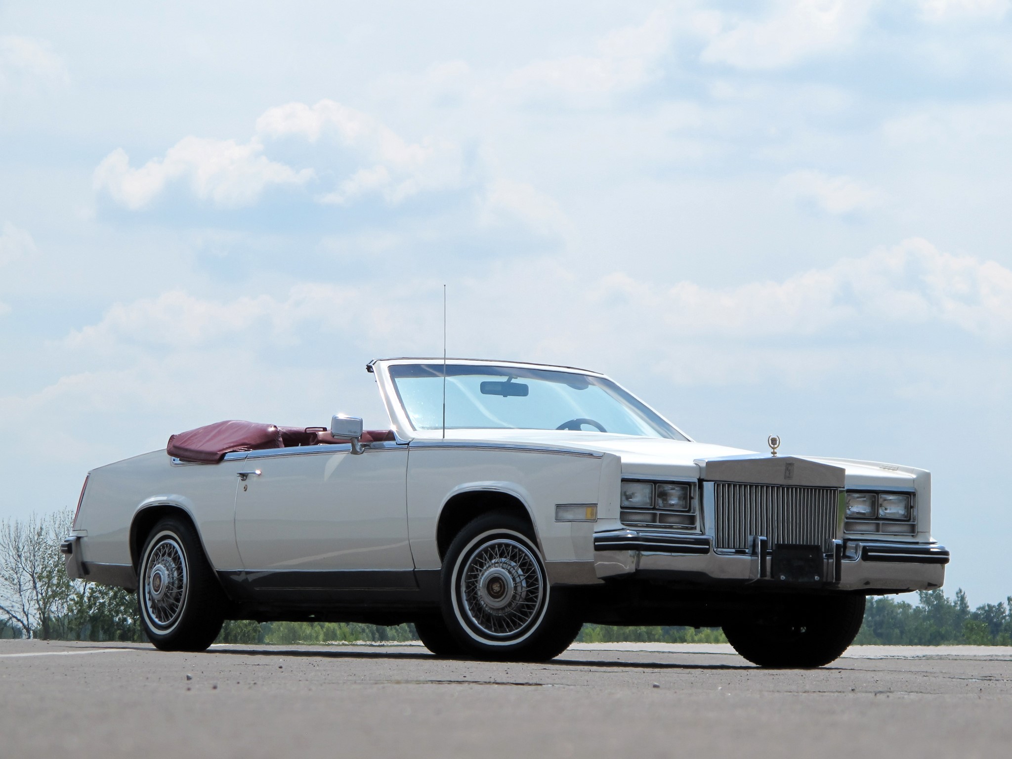 White Cadillac convertible with red interior HD Wallpaper