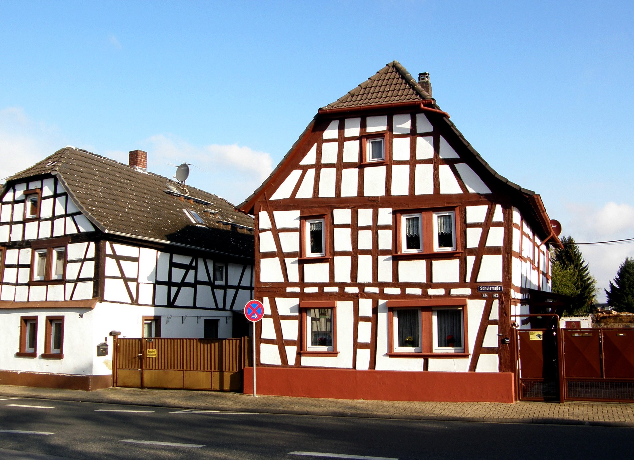 Half-timbered houses on a street in Germany HD Wallpaper