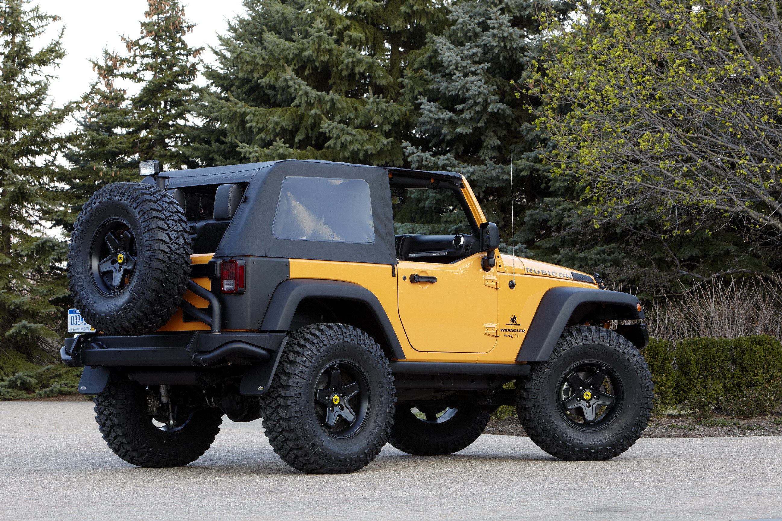 Yellow Jeep Wrangler Rubicon parked outdoors HD Wallpaper