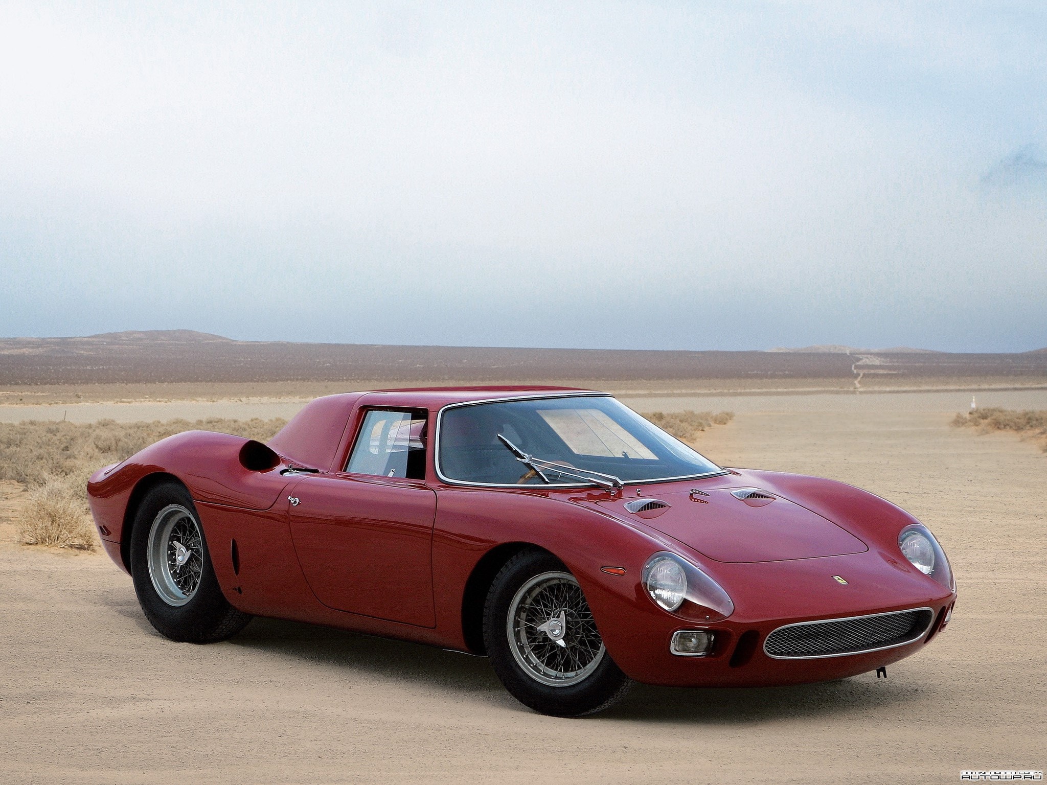 Red Ferrari 250 GTO in a Desert Landscape HD Wallpaper
