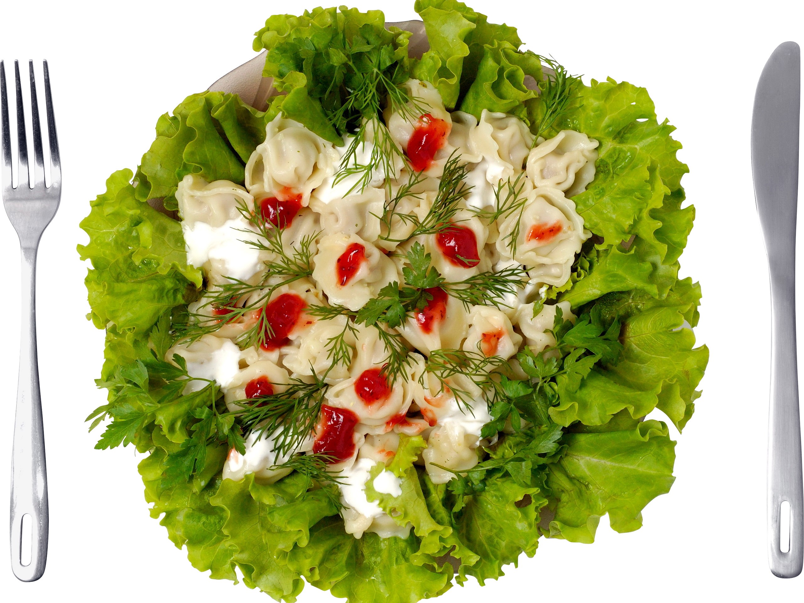 Dumplings with sour cream and herbs on lettuce HD Wallpaper