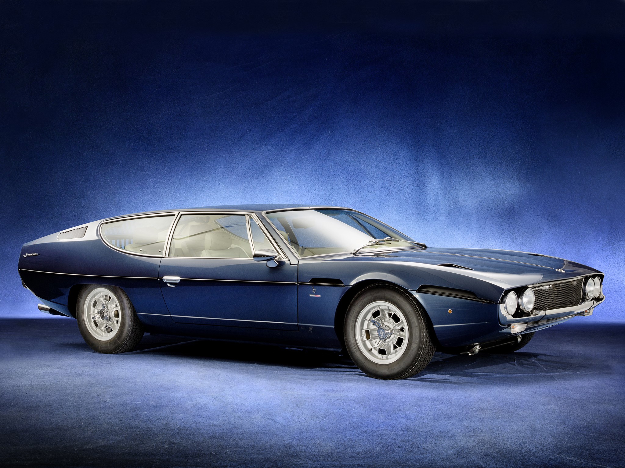Dark Blue Lamborghini Espada on a Blue Background HD Wallpaper
