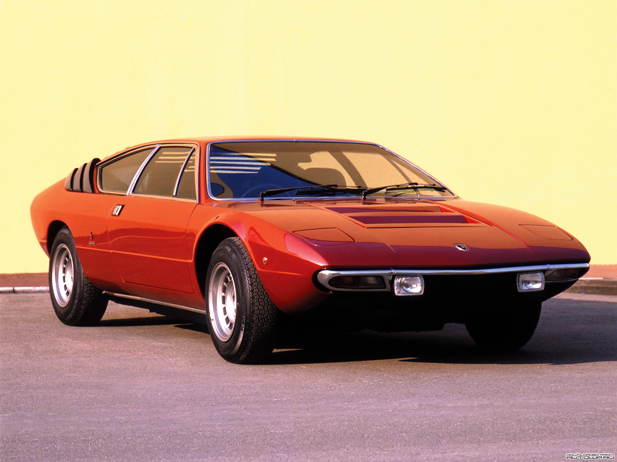 Orange Lamborghini Urraco parked on asphalt HD Wallpaper