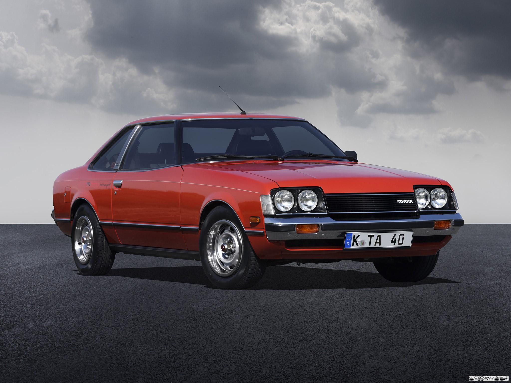 Red Toyota Celica coupe on asphalt HD Wallpaper