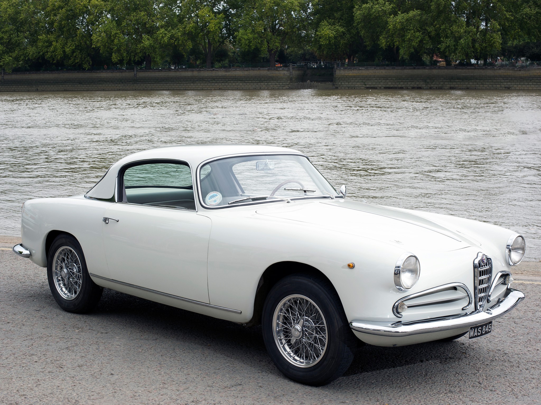 White Alfa Romeo car parked by a river HD Wallpaper