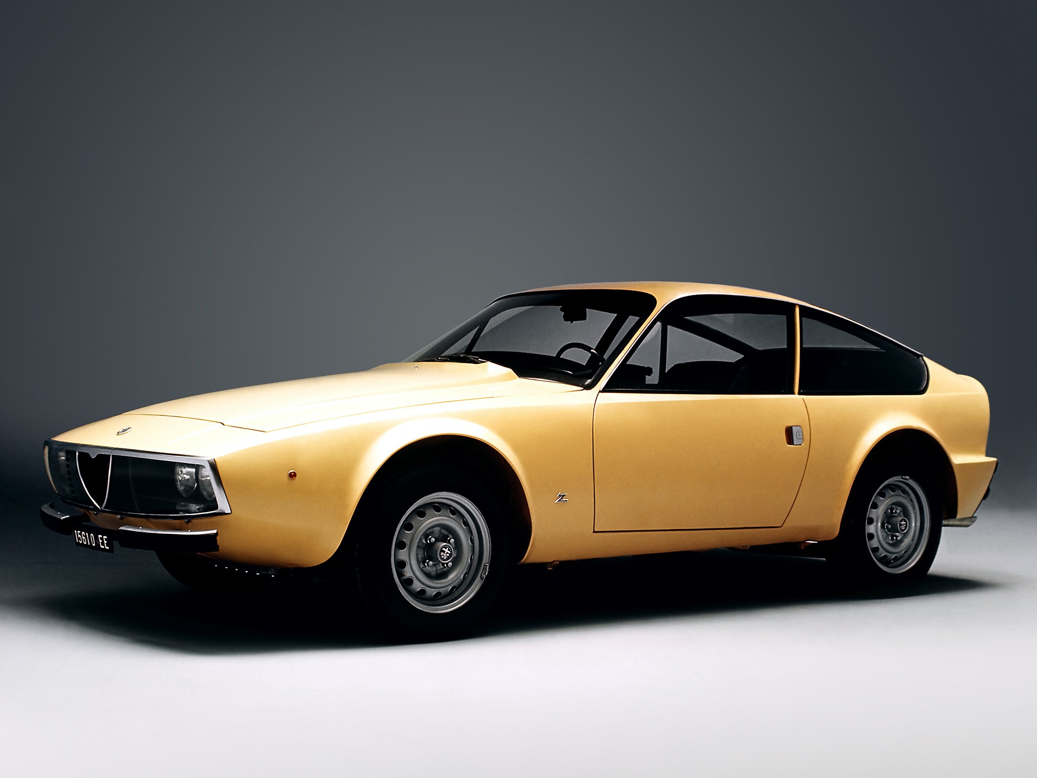 Yellow Alfa Romeo GT 1300 Junior HD Wallpaper