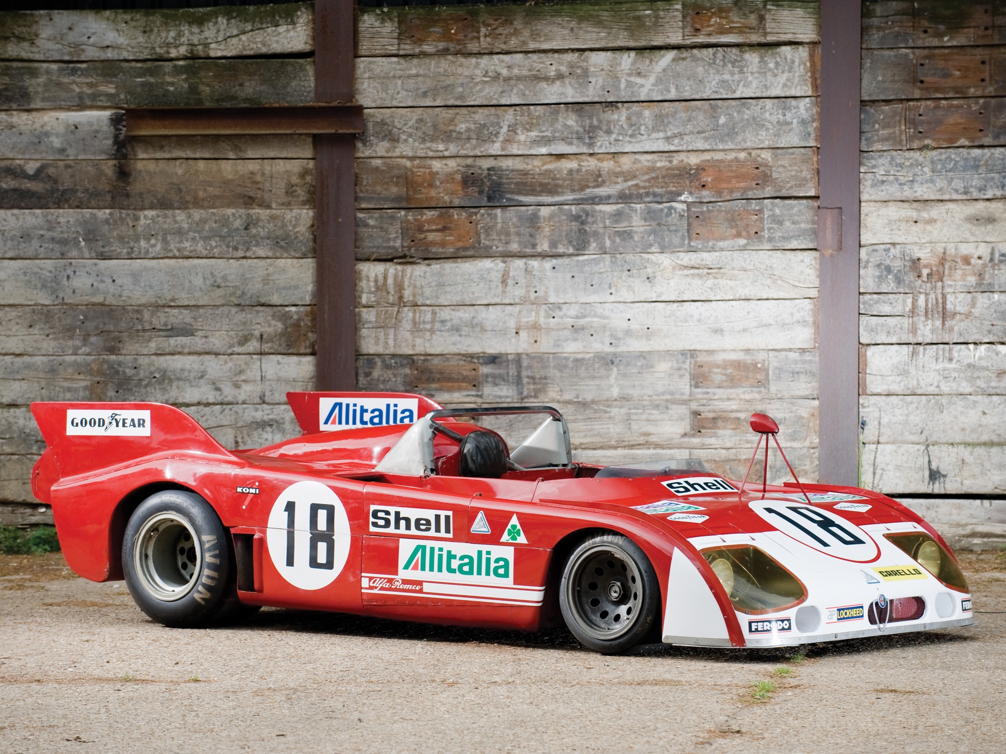 Red Alfa Romeo racing car with number 18 HD Wallpaper