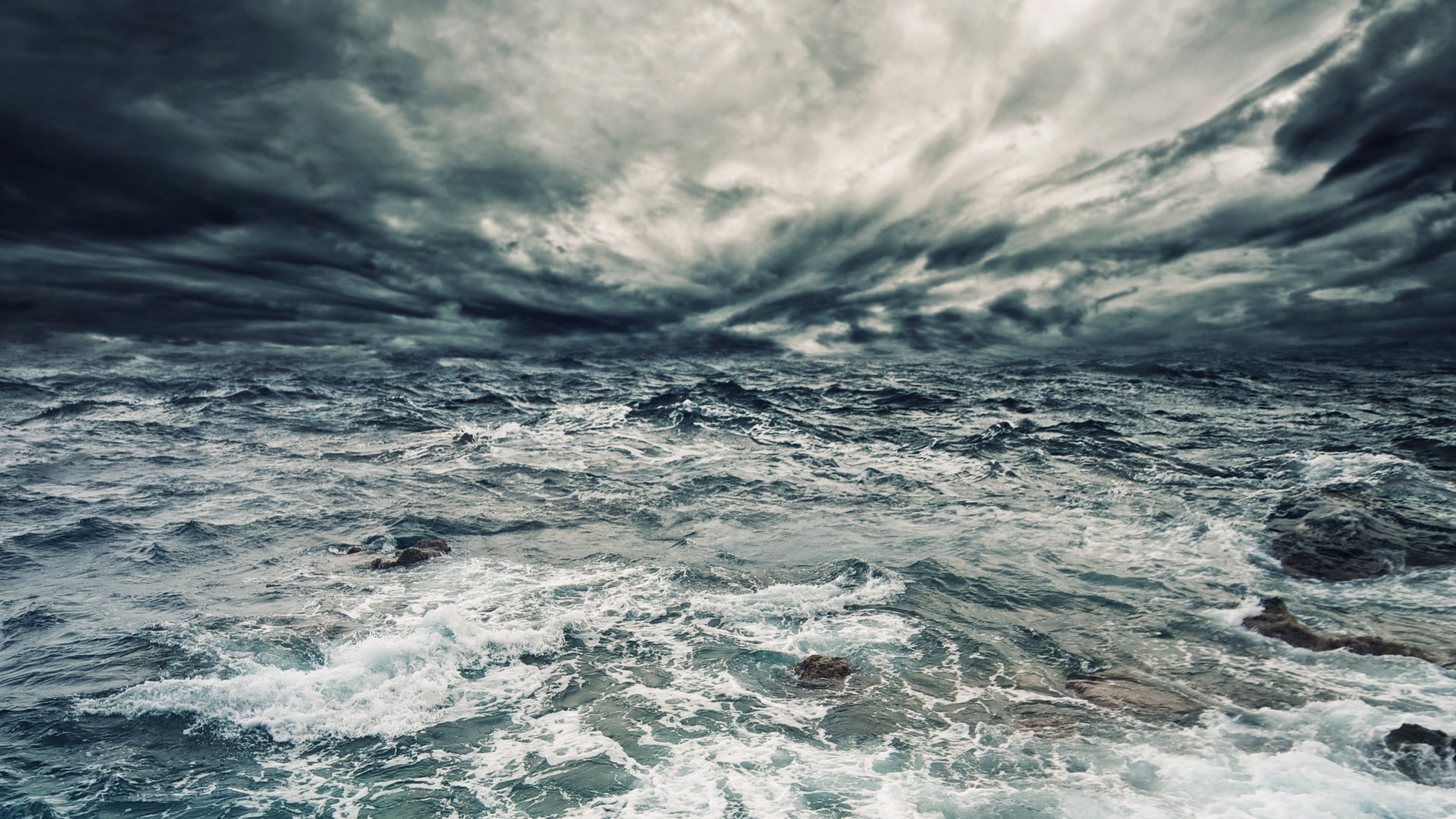 Stormy ocean with dark clouds and waves HD Wallpaper