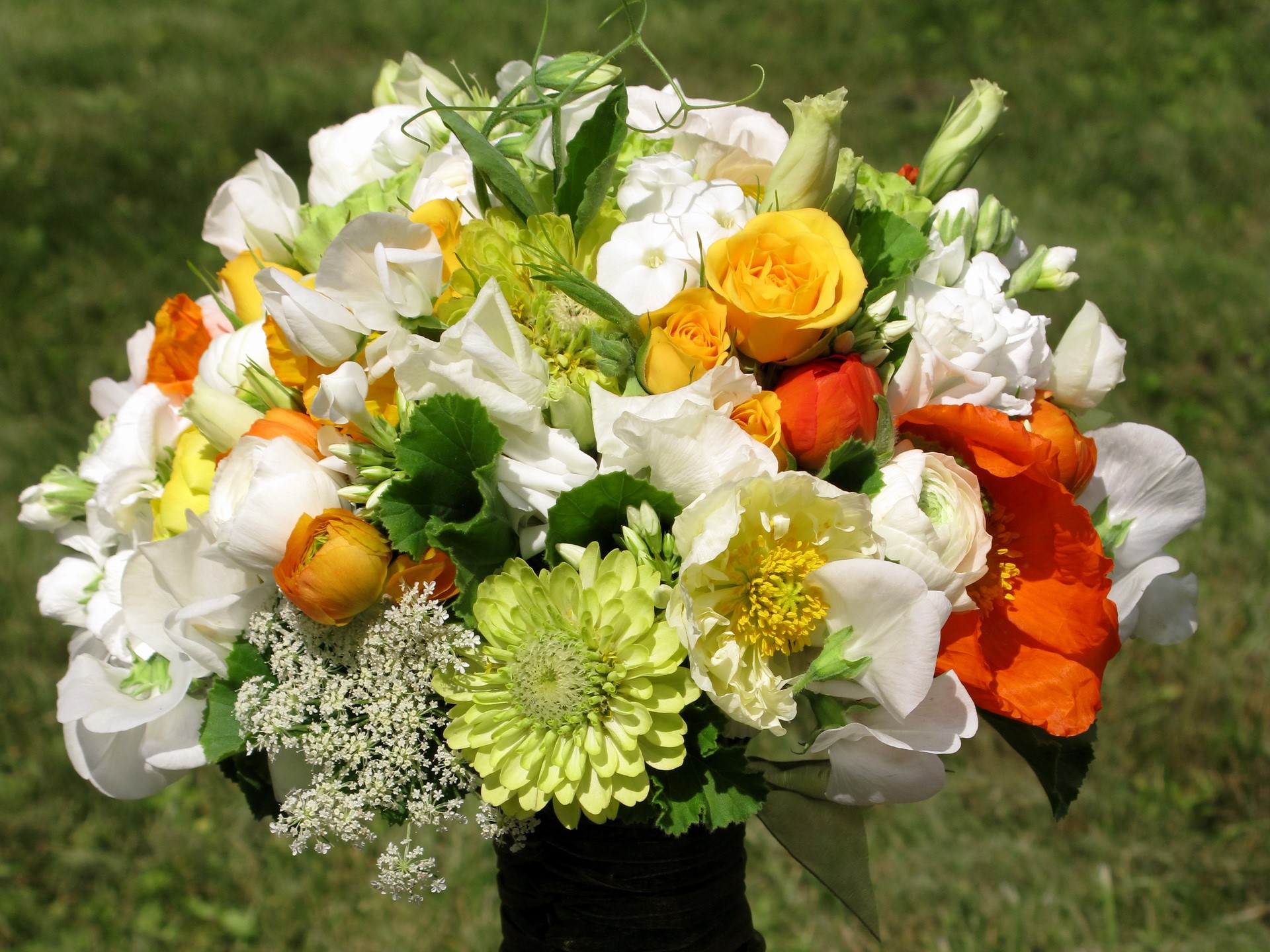 A vibrant bouquet of assorted flowers HD Wallpaper