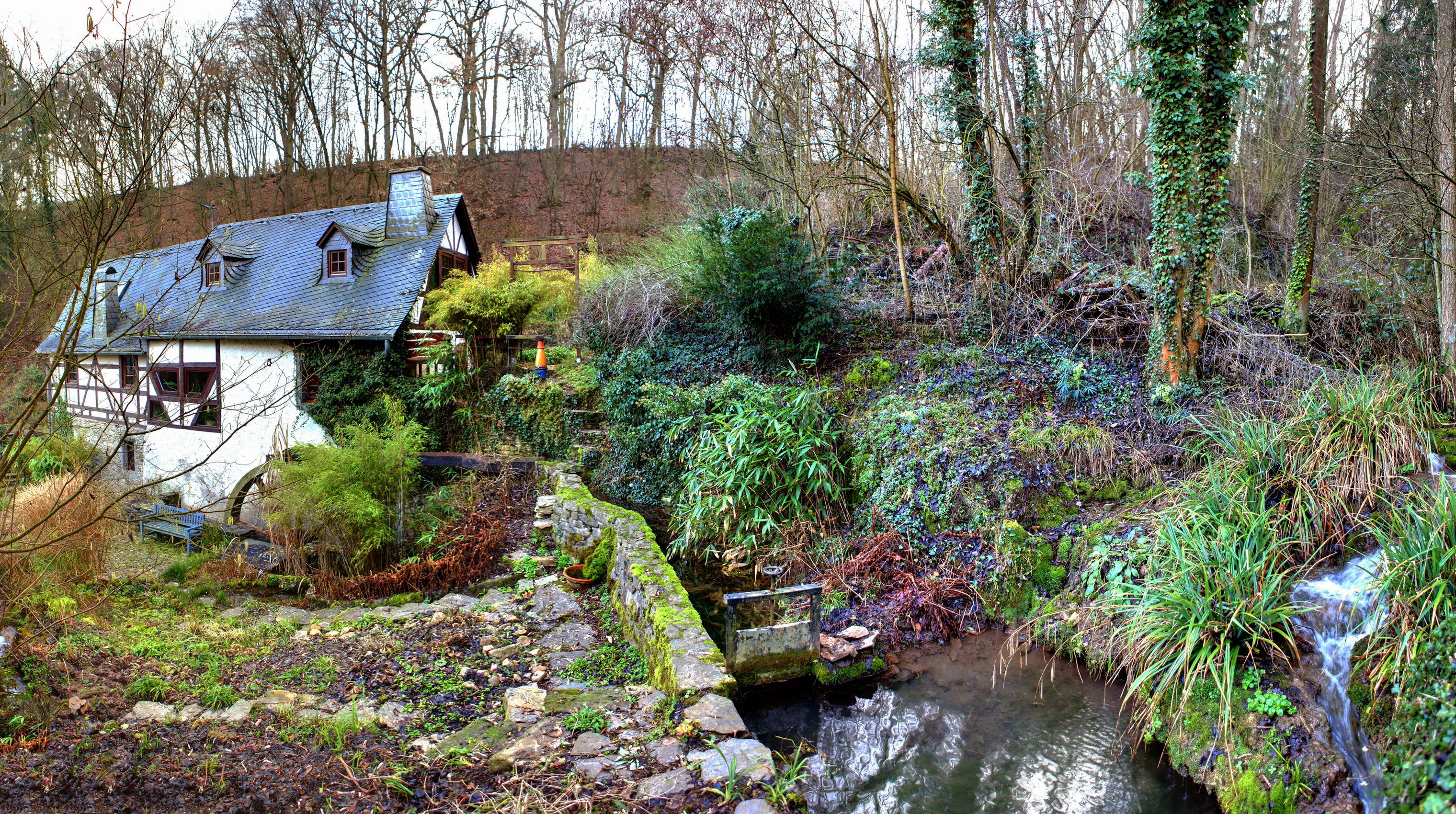 Old mill house by a stream in a forest, Germany HD Wallpaper
