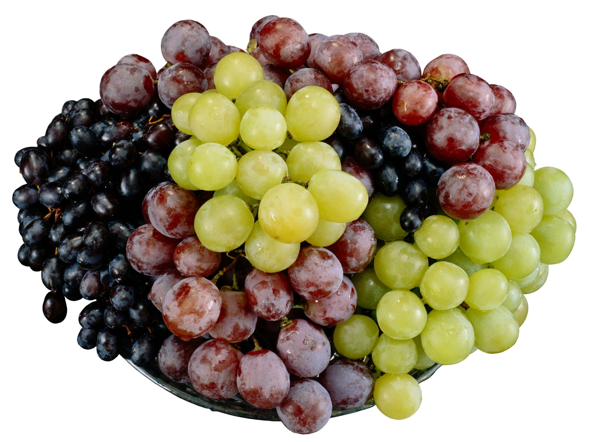A bowl of red, green, and black grapes HD Wallpaper