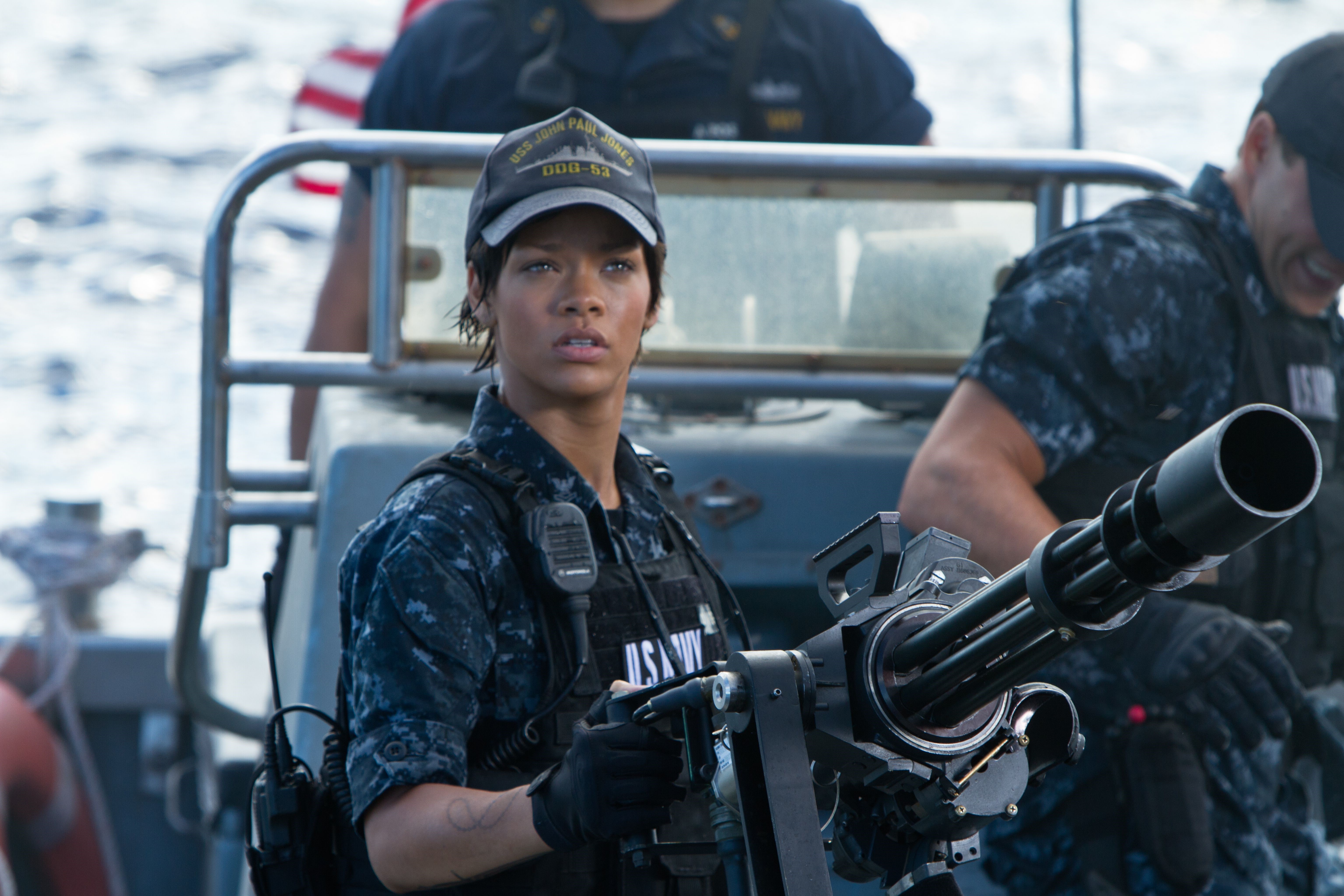 Woman in US Navy uniform with Gatling gun HD Wallpaper