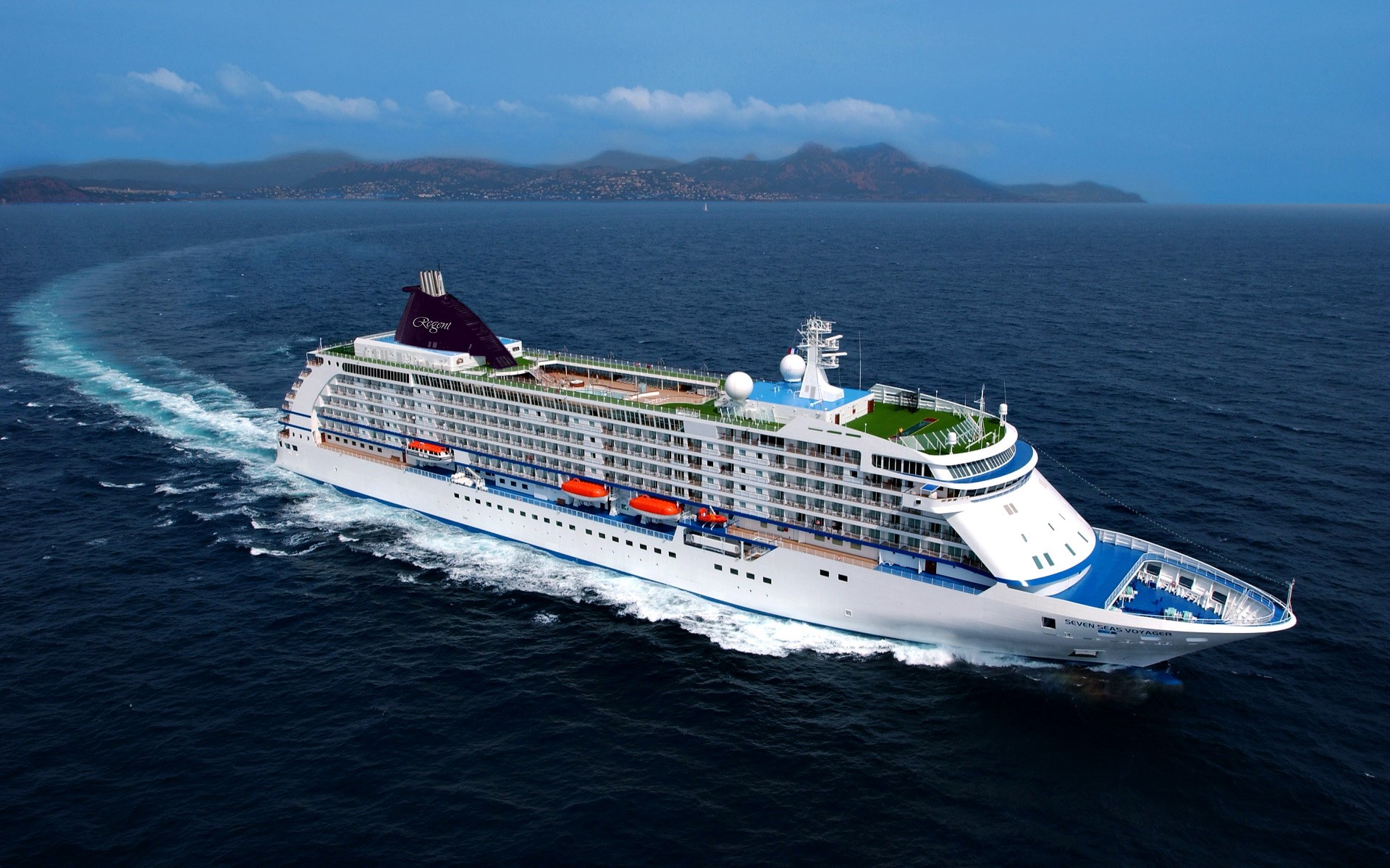 Seven Seas Voyager cruise liner sailing on the ocean HD Wallpaper