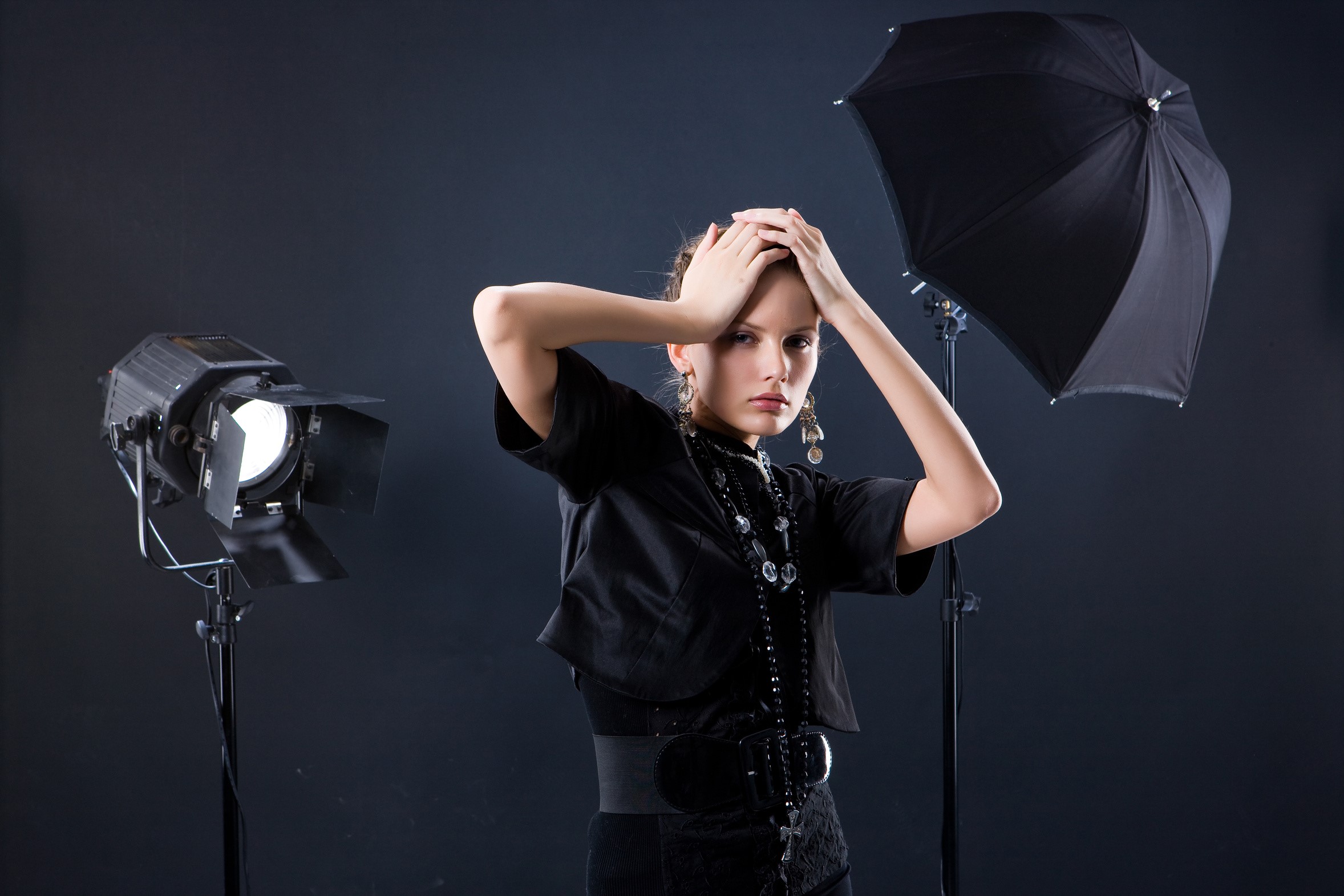 Woman posing with studio lighting and umbrella HD Wallpaper