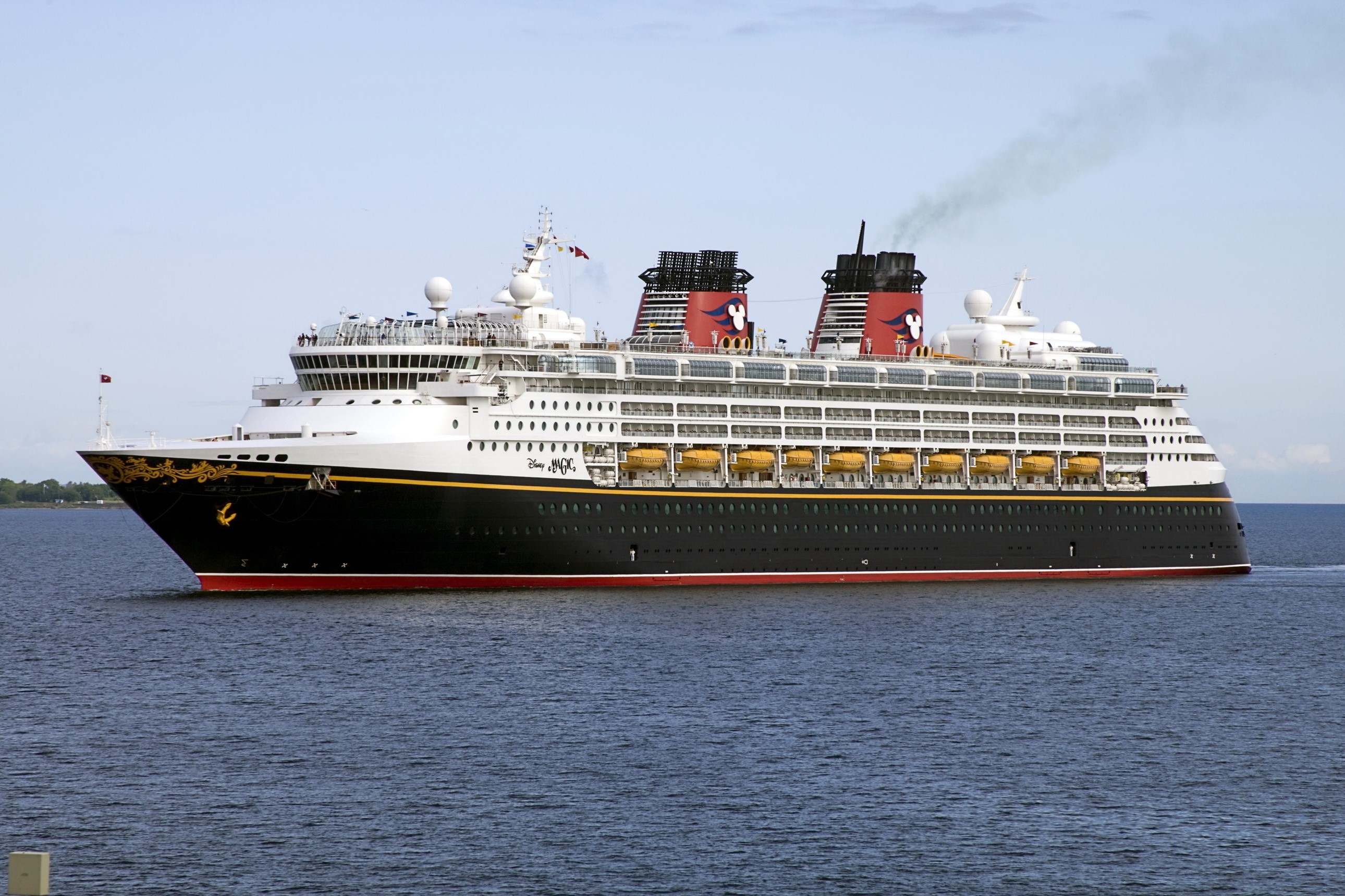 Disney Magic cruise ship sailing on the water HD Wallpaper