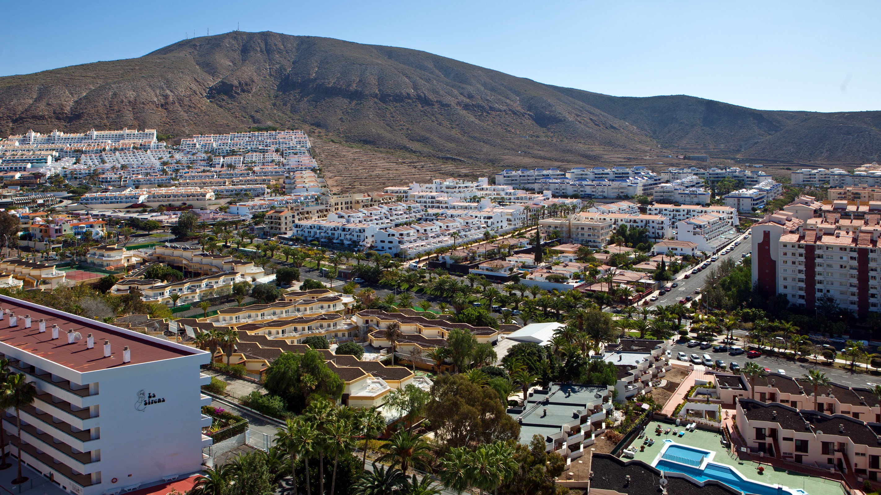 Aerial view of a coastal town in the Canary Islands, Spain HD Wallpaper