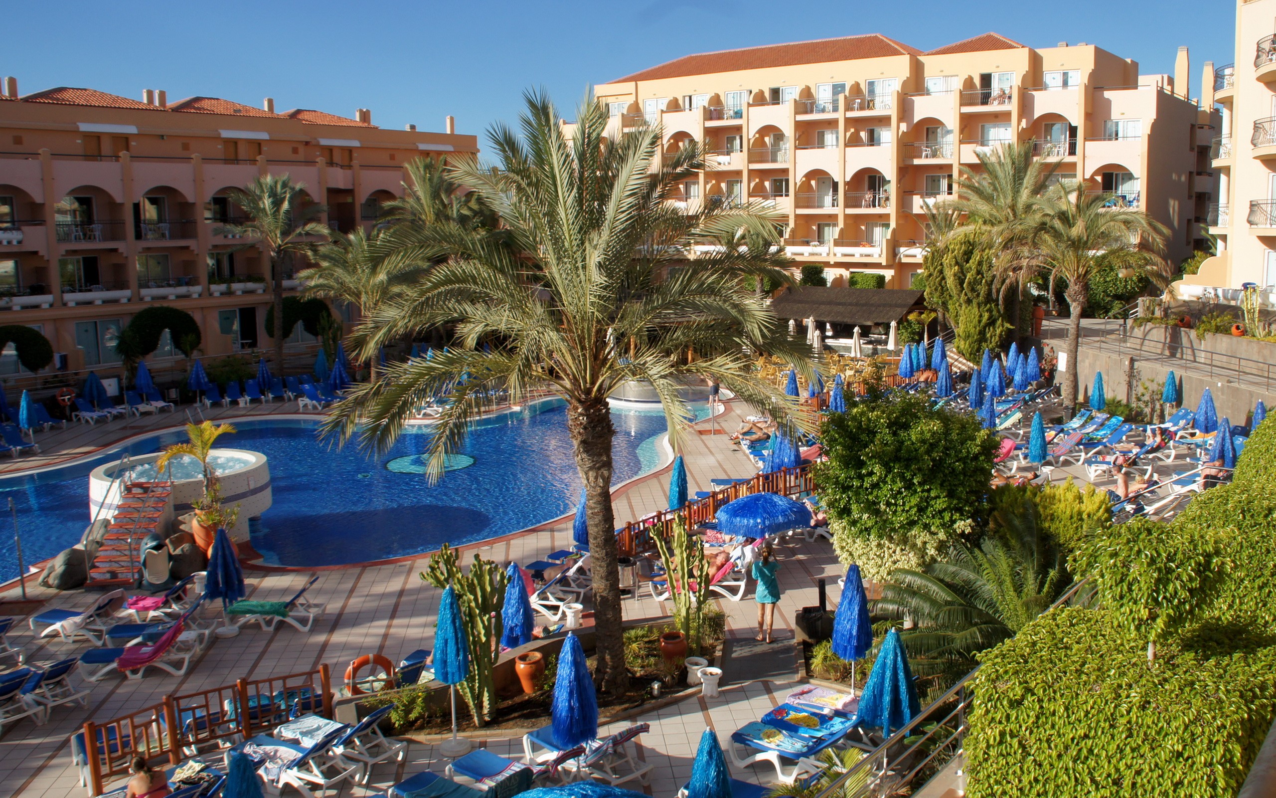 Resort with swimming pools and palm trees in the Canary Islands HD Wallpaper