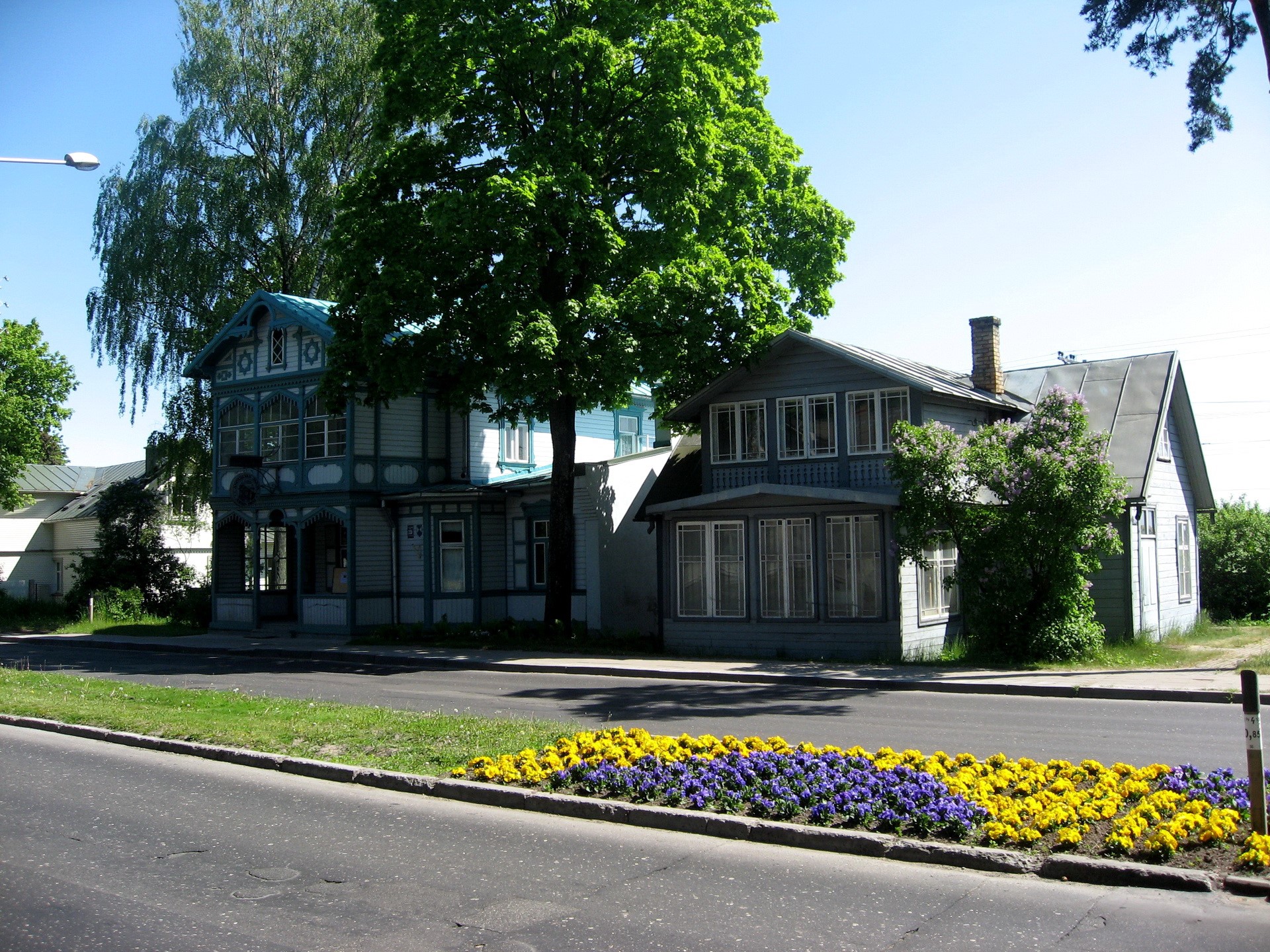 Two wooden houses with flowers in Jurmala, Latvia HD Wallpaper